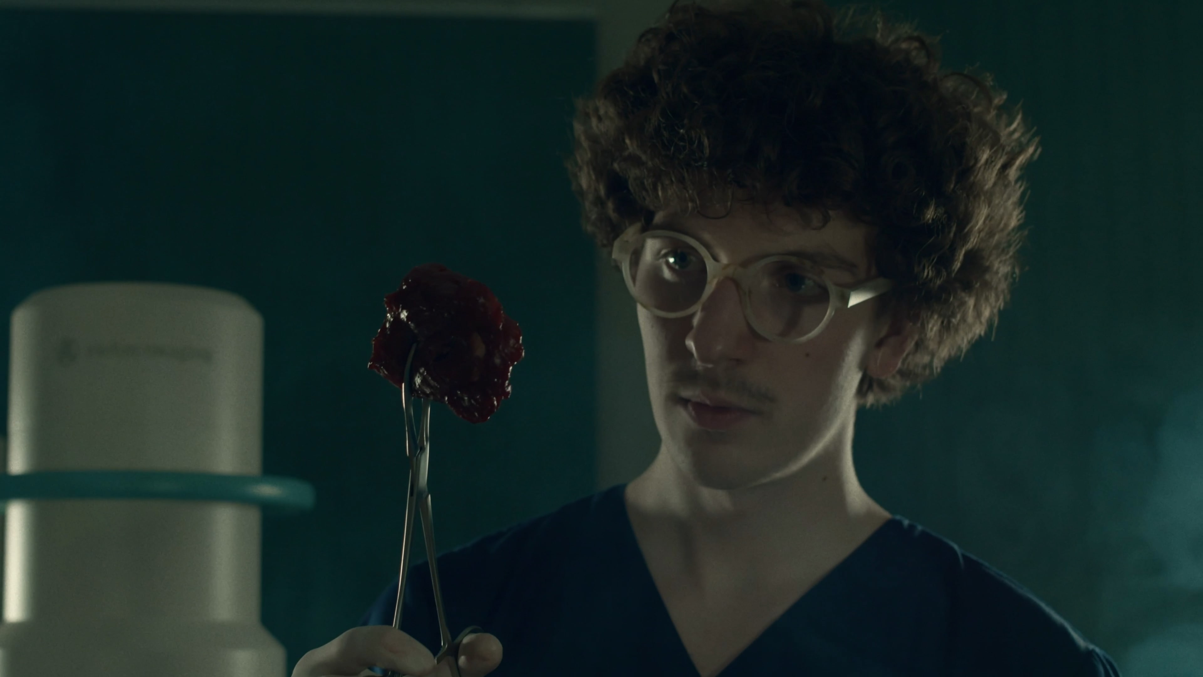 boy is looking at meat