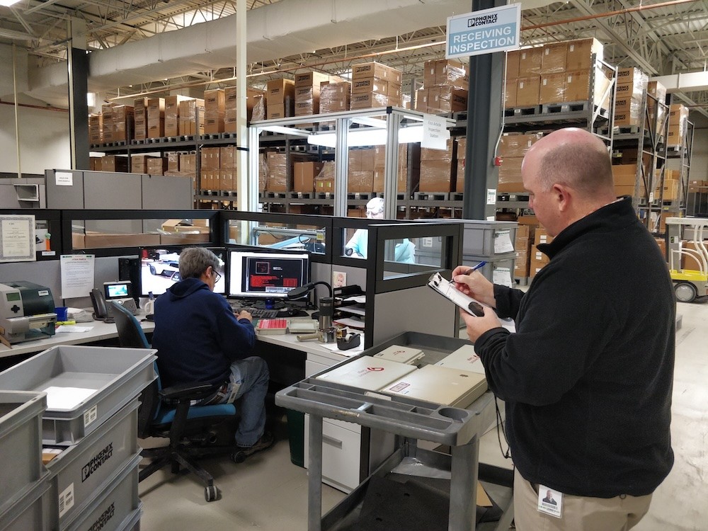 Photo of Andy Mathers conducting research inside Phoenix Contact