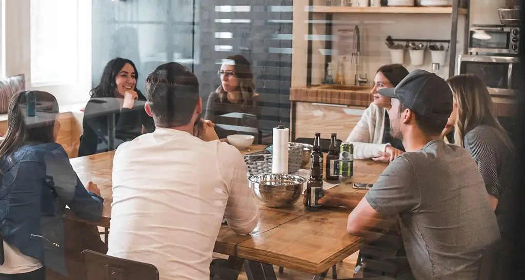 industrial robot arm is holding a syringe