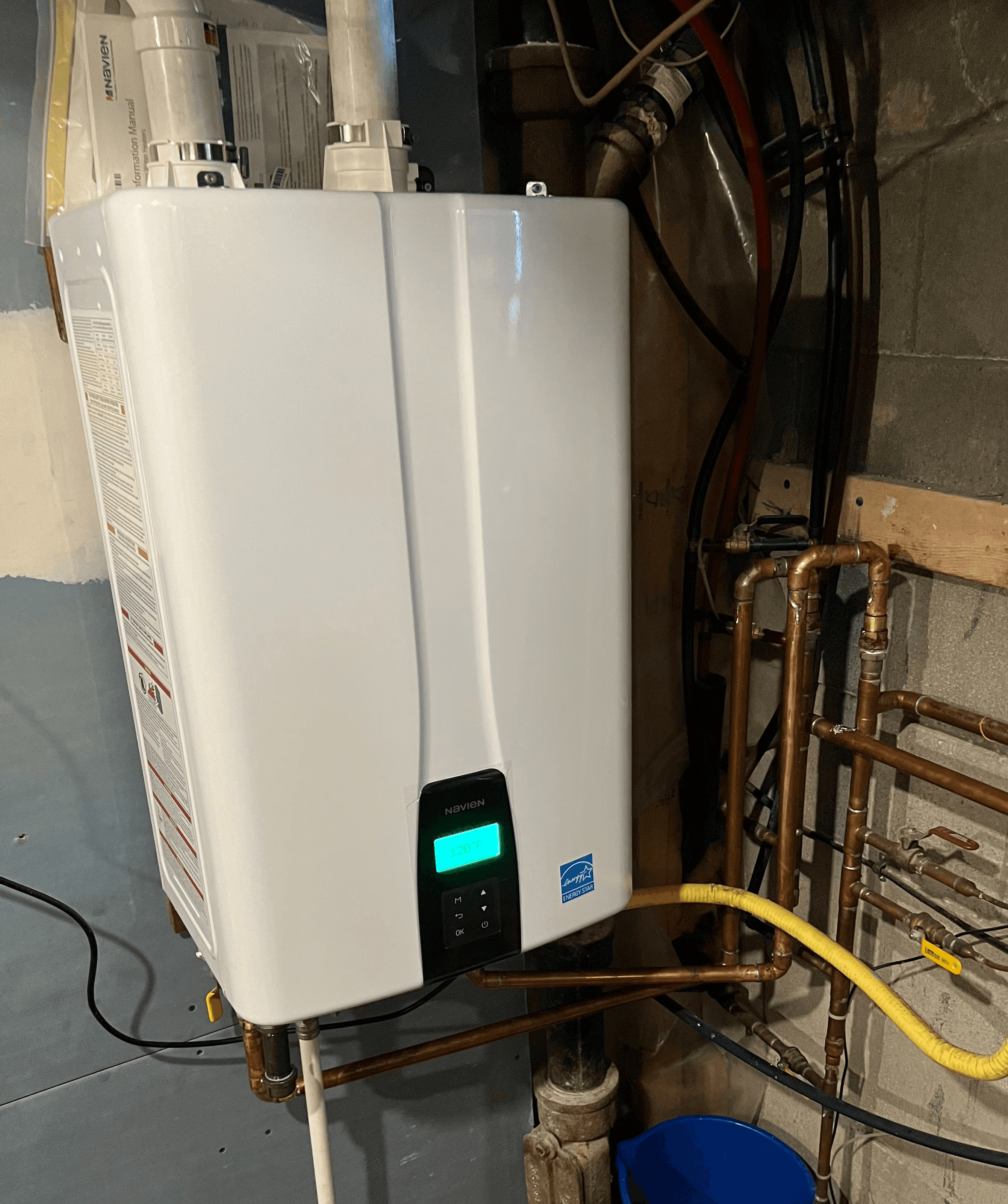 Tankless water heater mounted in mississauga home