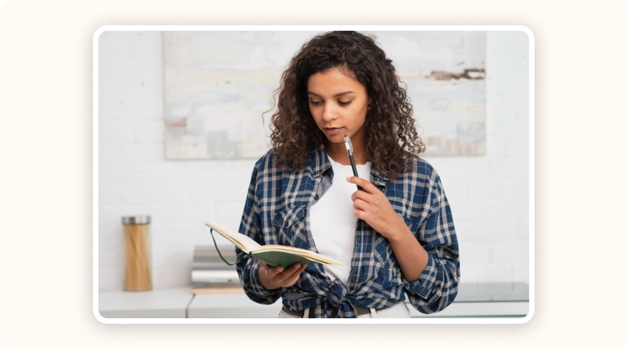 Woman appearing deep in thought