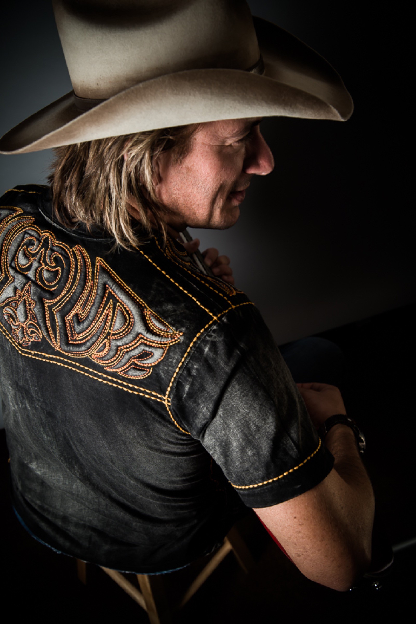 Dark editorial musician branding portrait