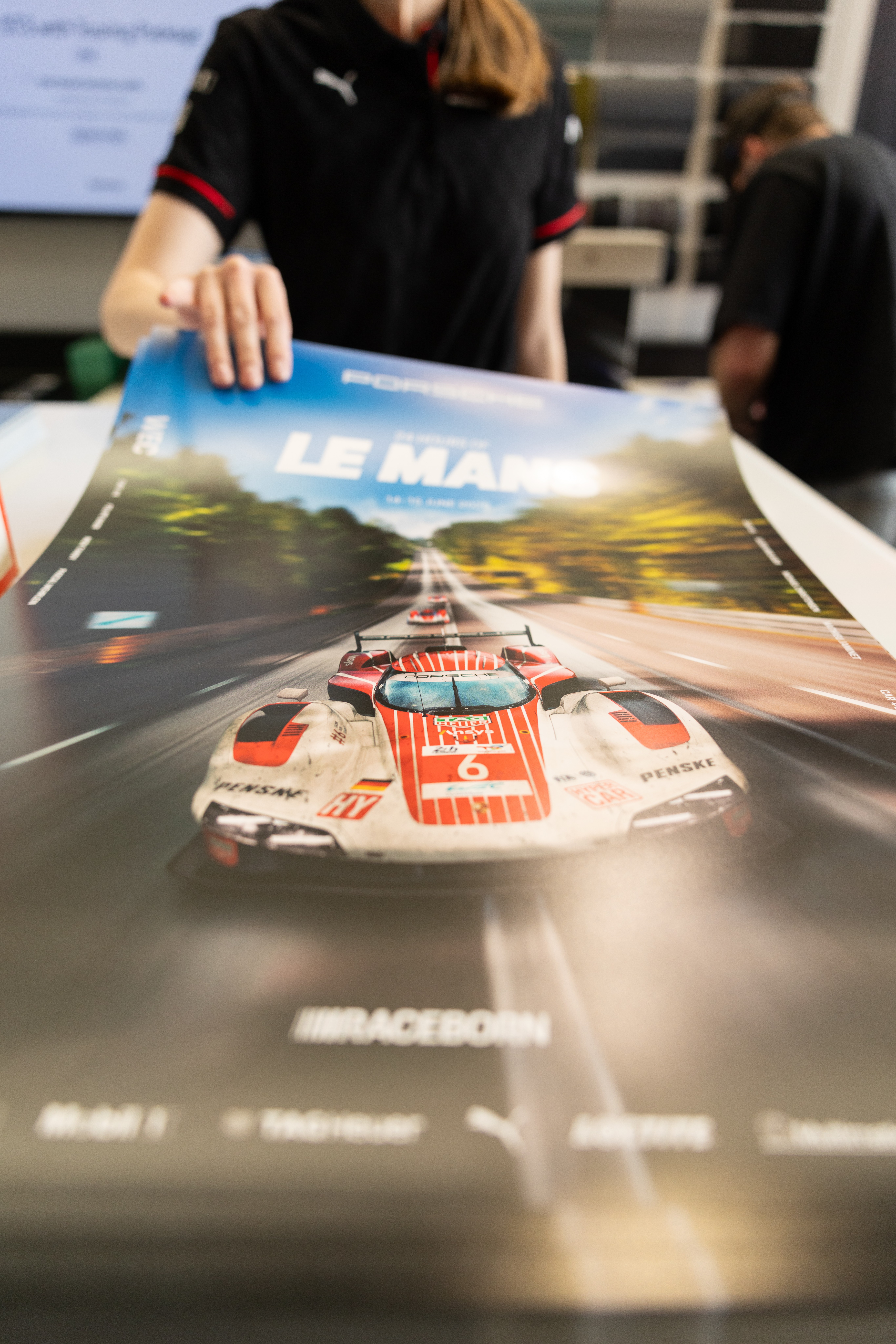 Streetside billboard with flyposters of the Batch.Works brand and illustrations