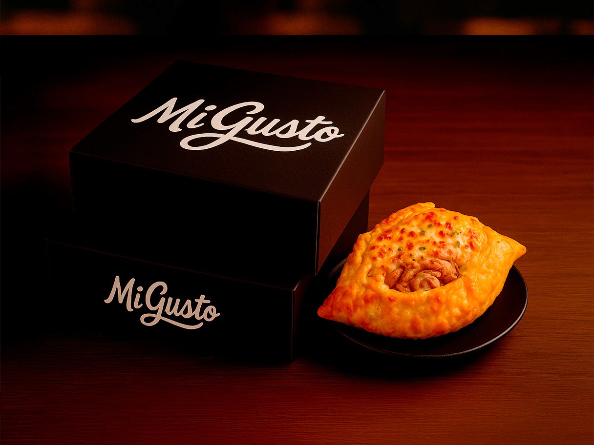 Rooftops of a coastal town with the sea in background