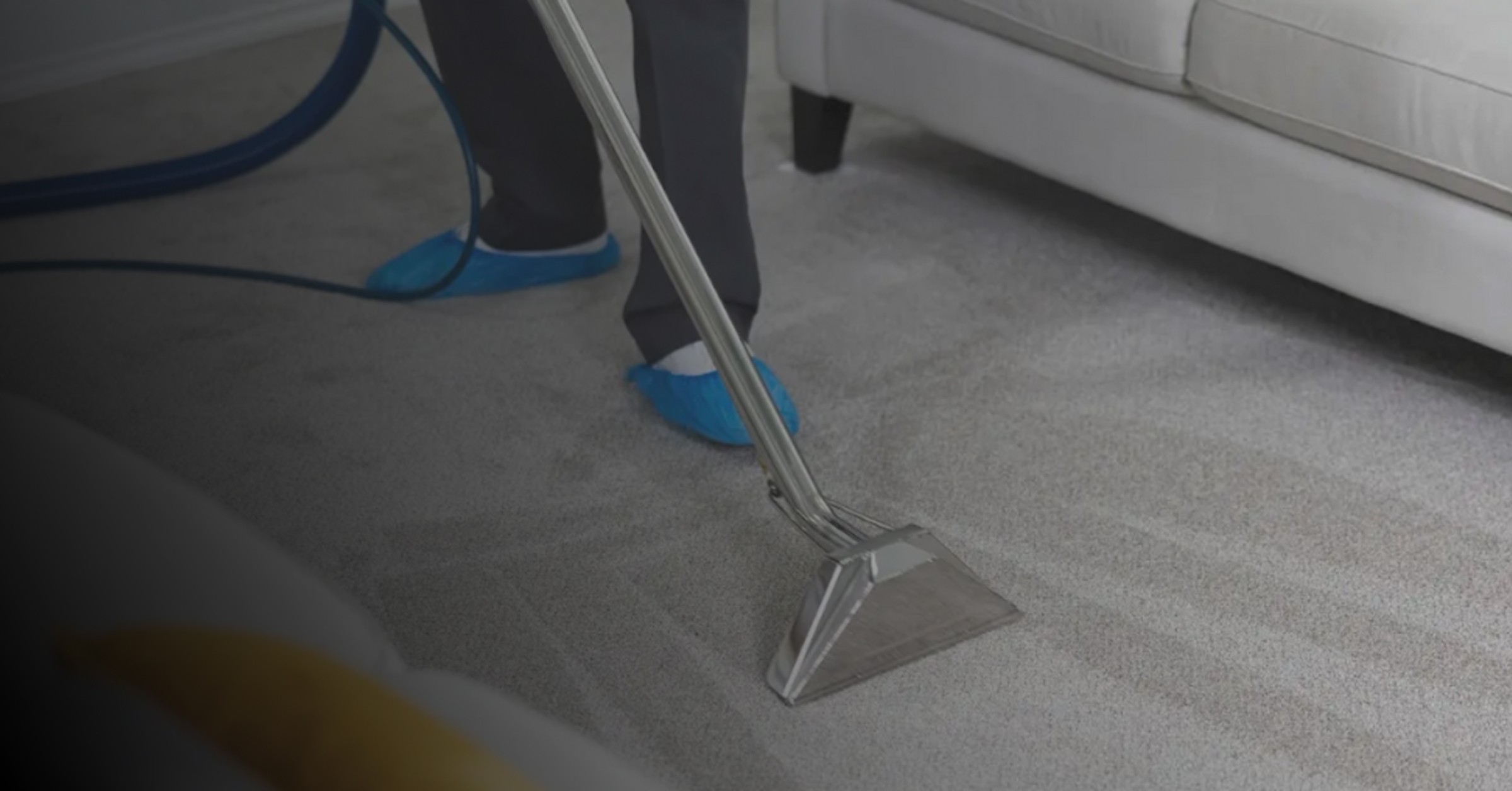 a man in a mask using a machine