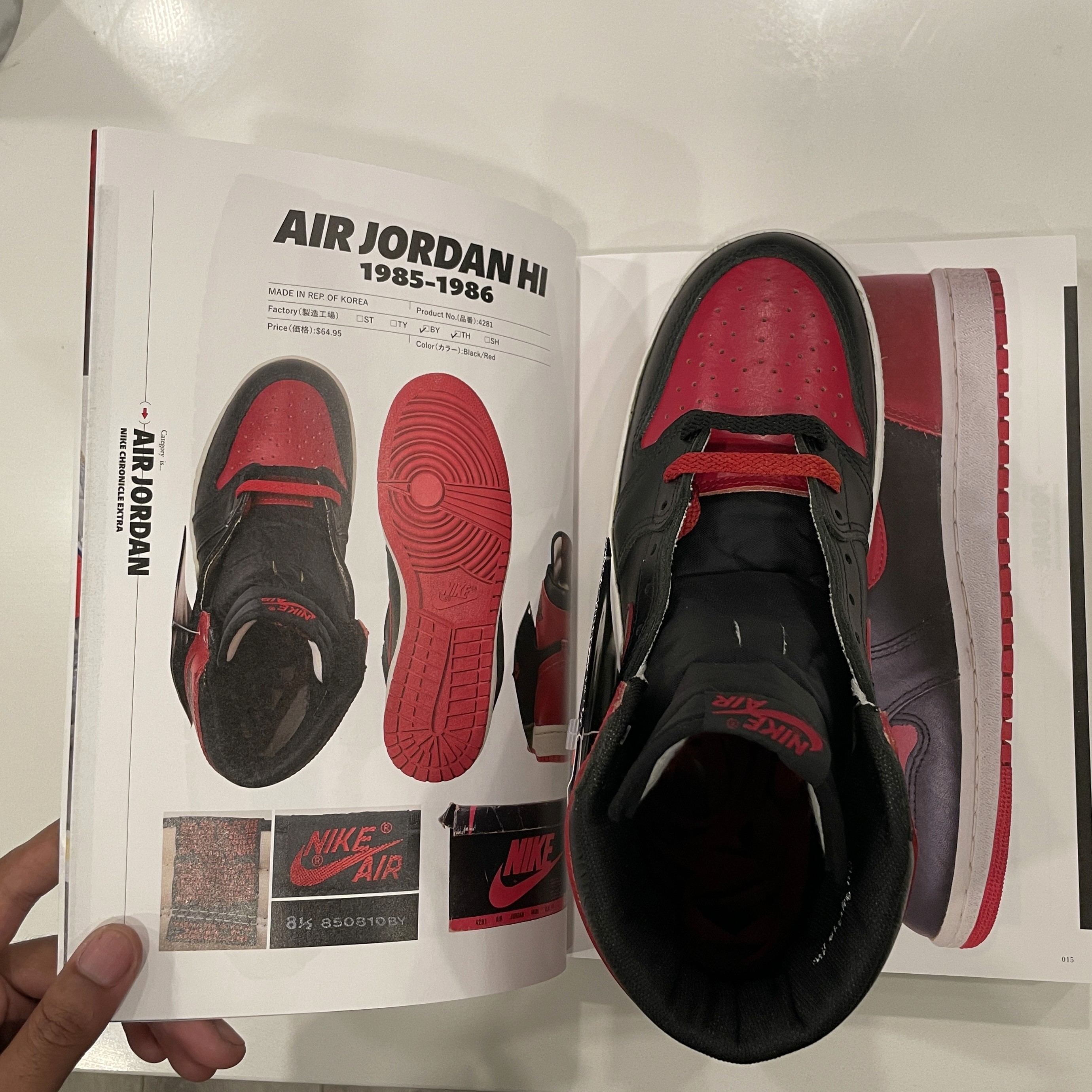 Editorial magazine design standing upright with oversized typography and clean layout