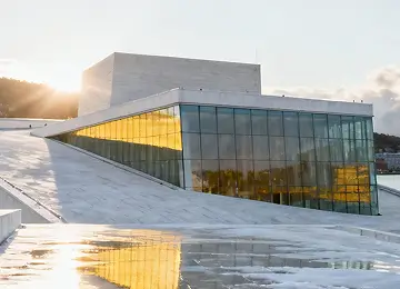 Modern glass-front commercial building with a flat roof