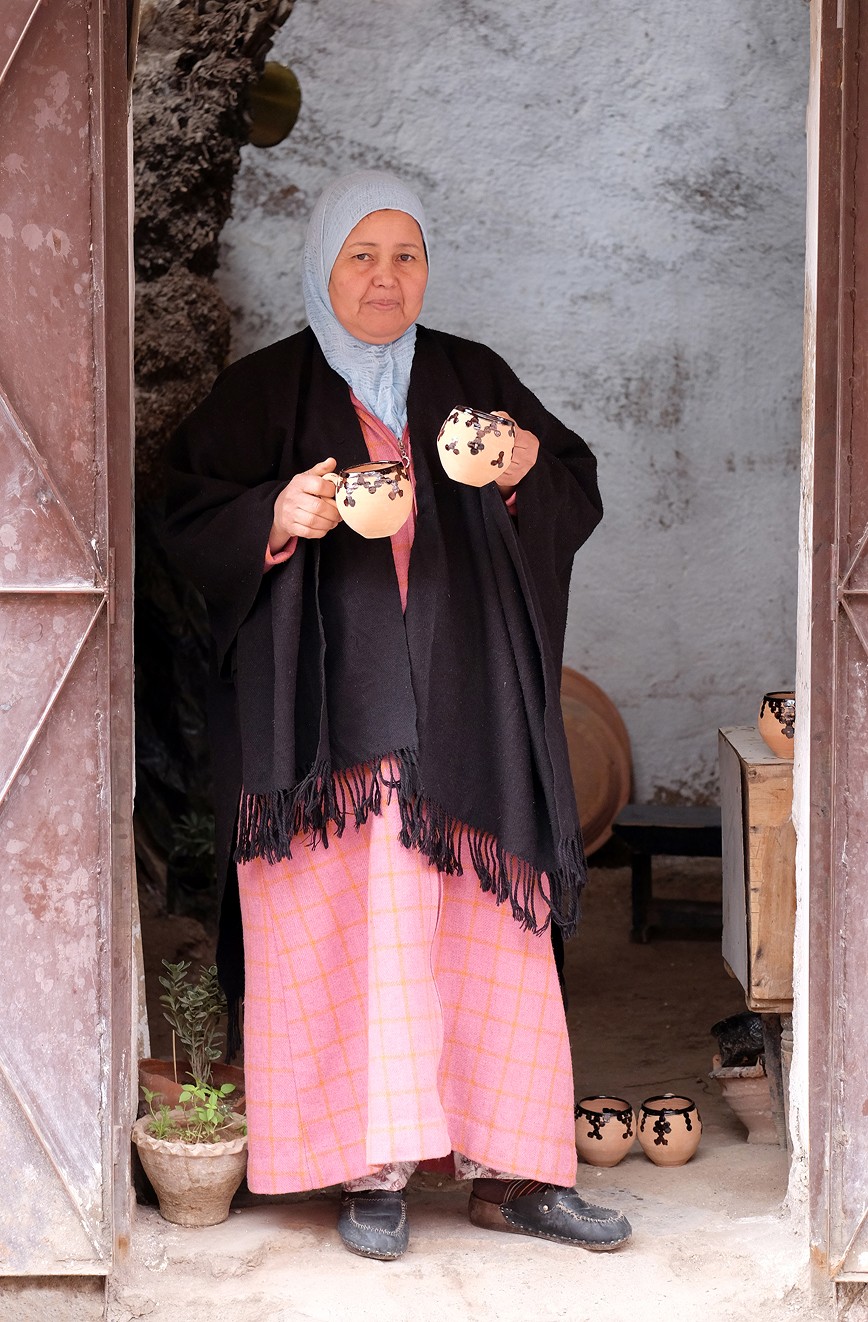Modern office with wooden desk and shelves