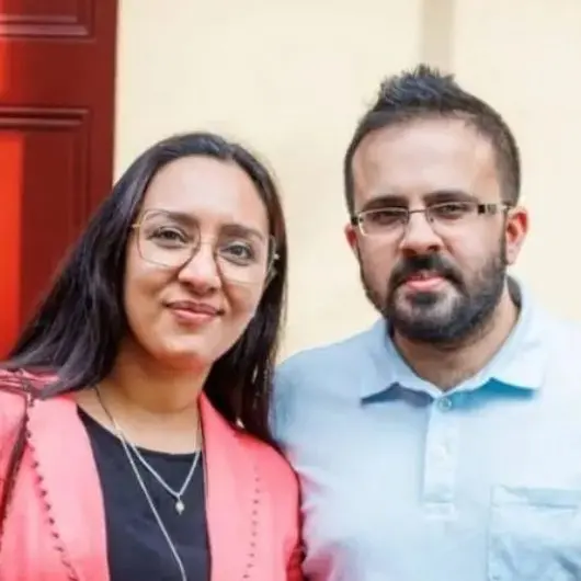 Couple posing for a photo.