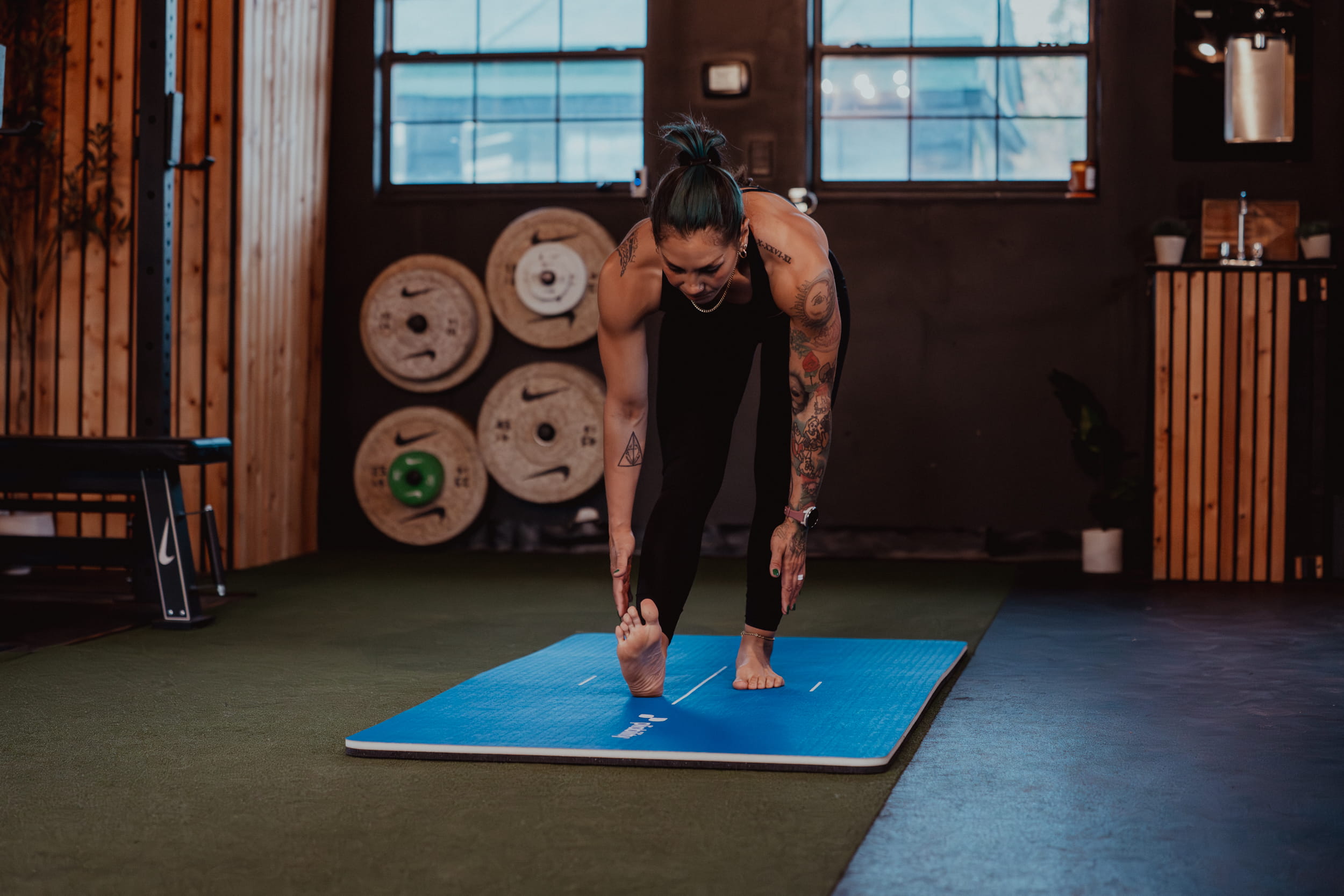 person in gym - Elbow Stiffness and Pain