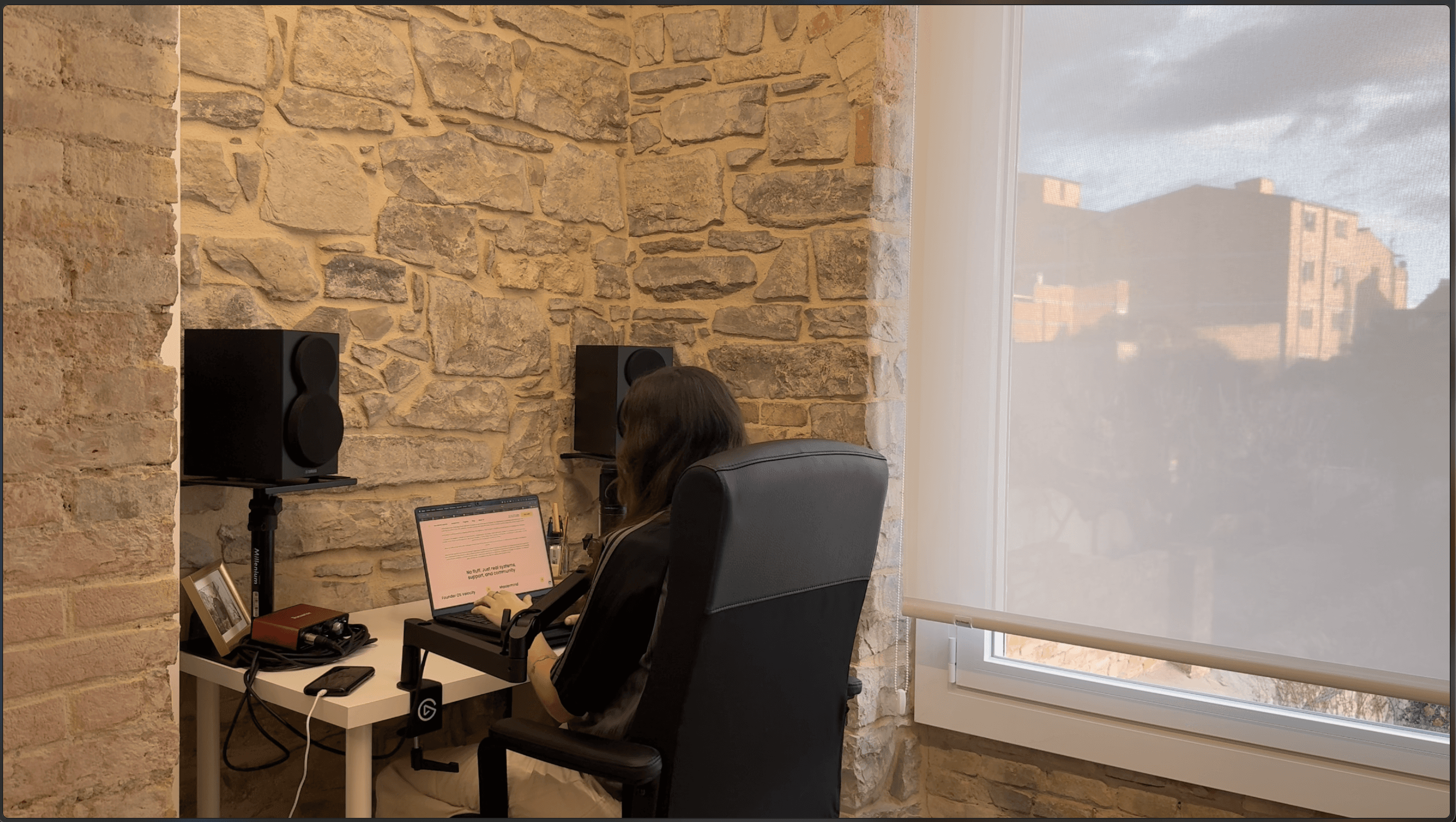 black flat screen computer monitor on brown wooden desk