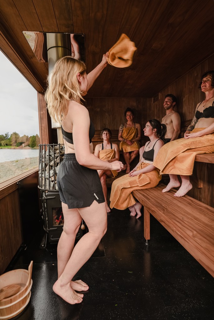 Massage therapist massaging a person's back