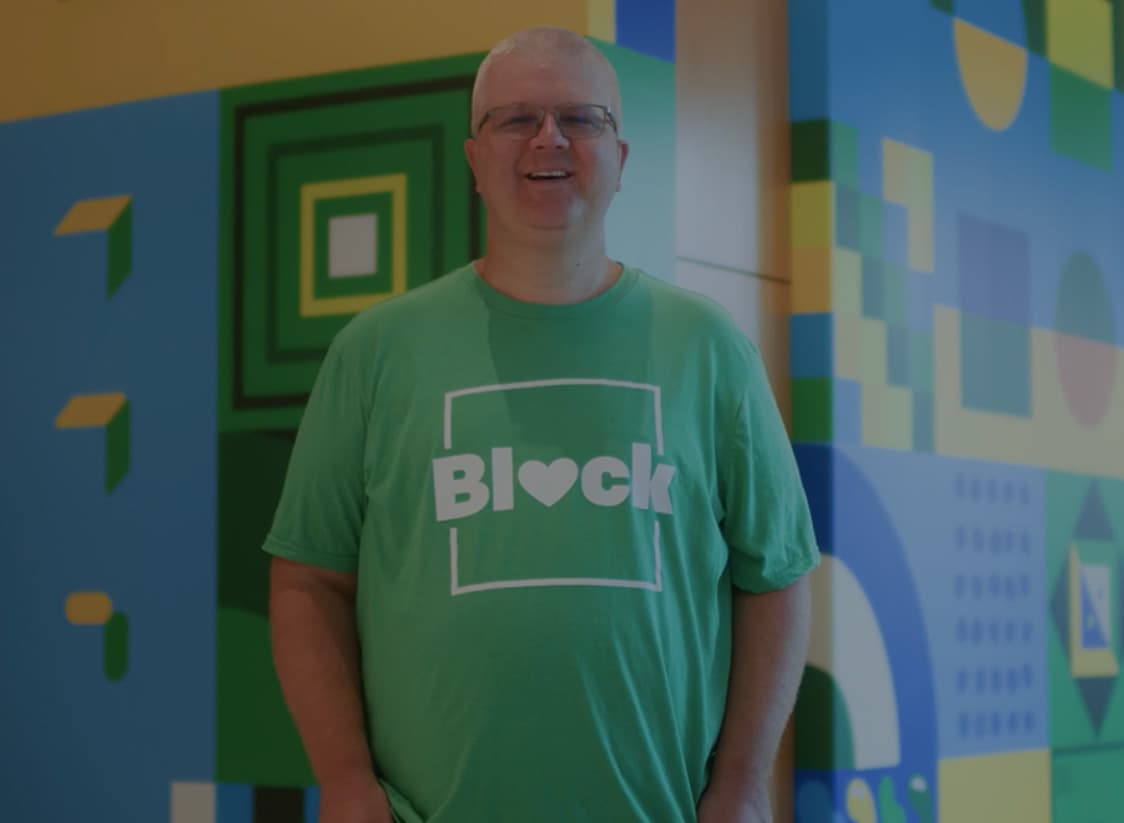 WTADS client H&R Block employee in green shirt.