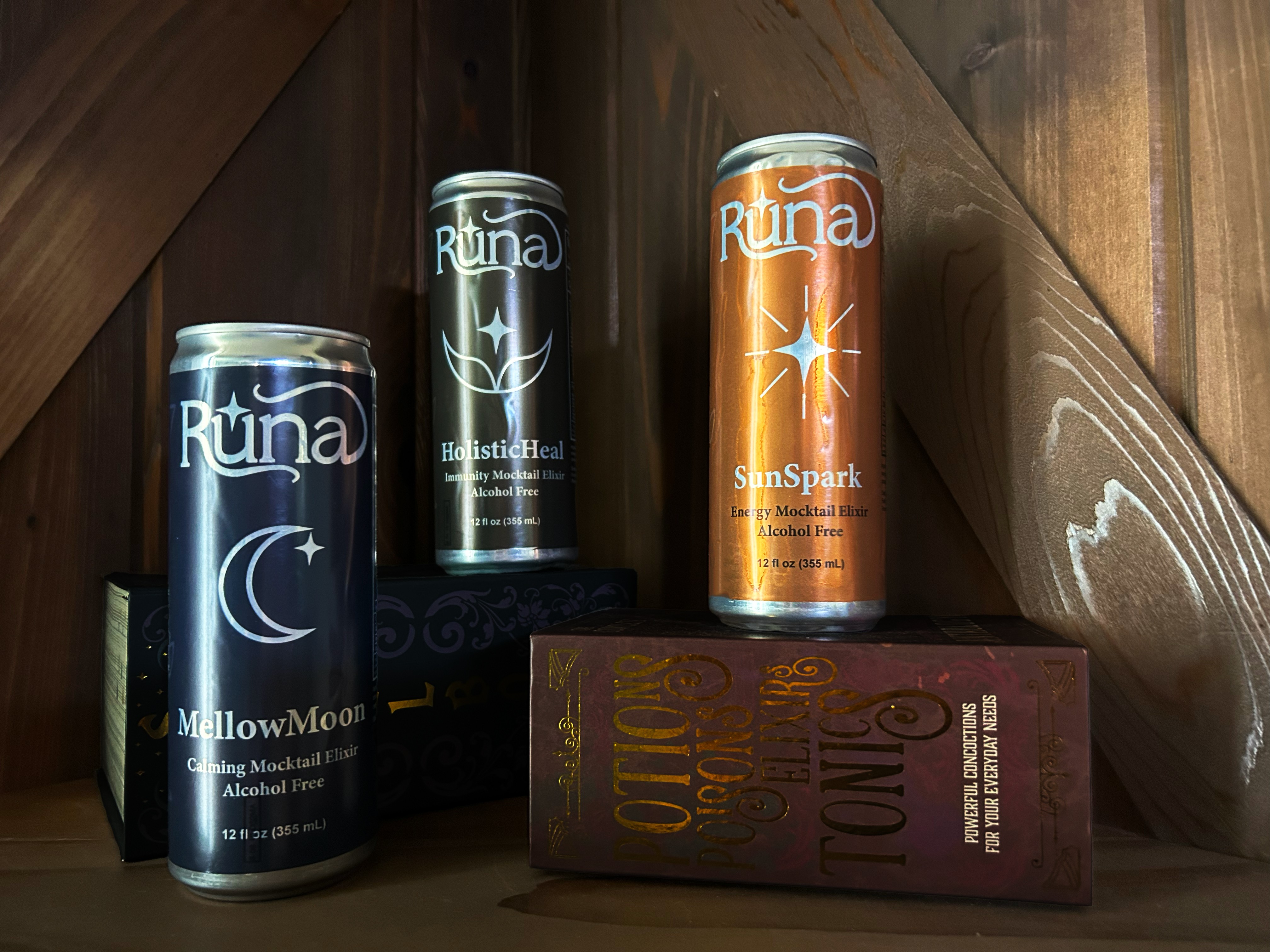 Image of three beverage cans with the Runa logo, flavor symbols, and descriptions
