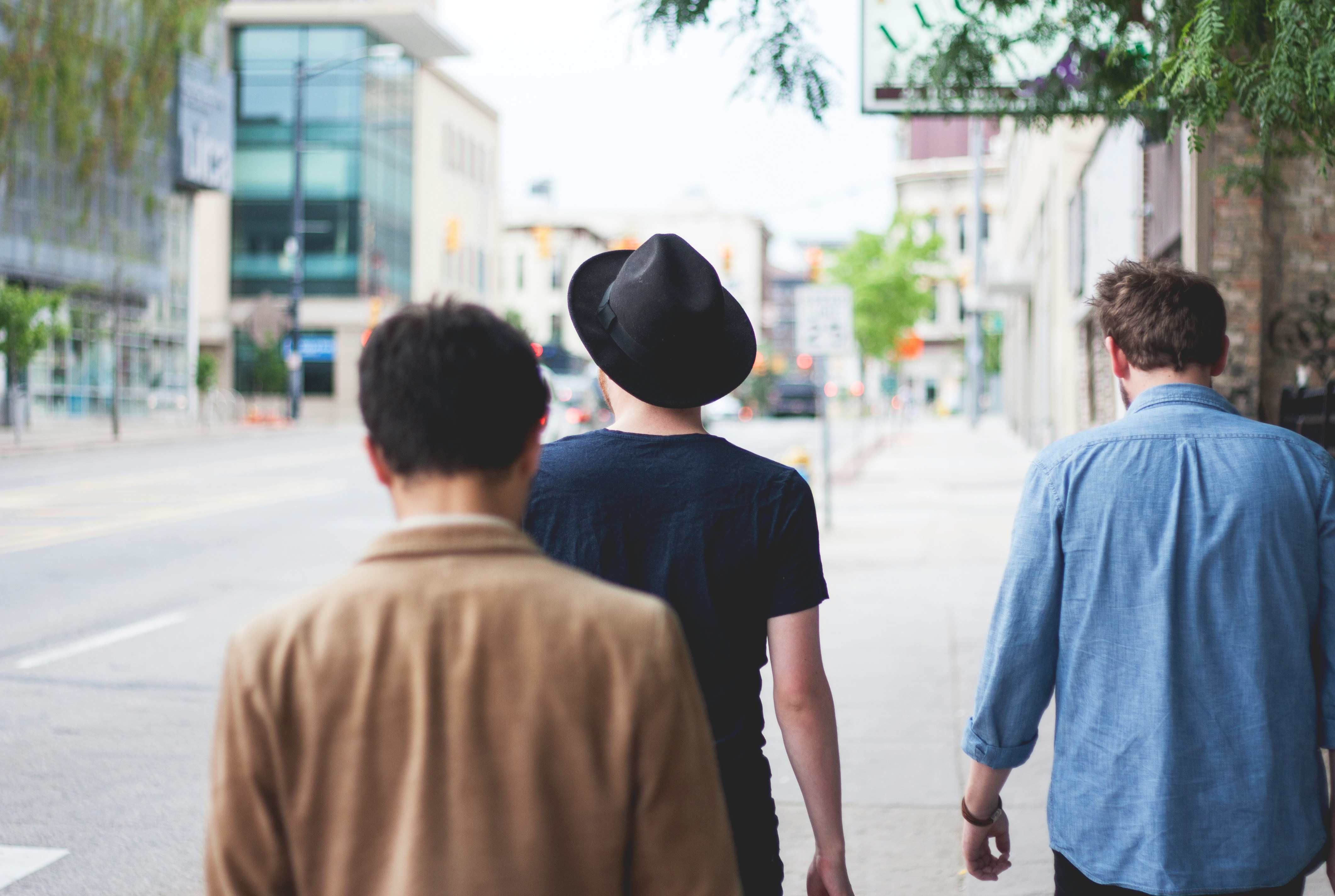 men walking down a street - Fall Family Outfits