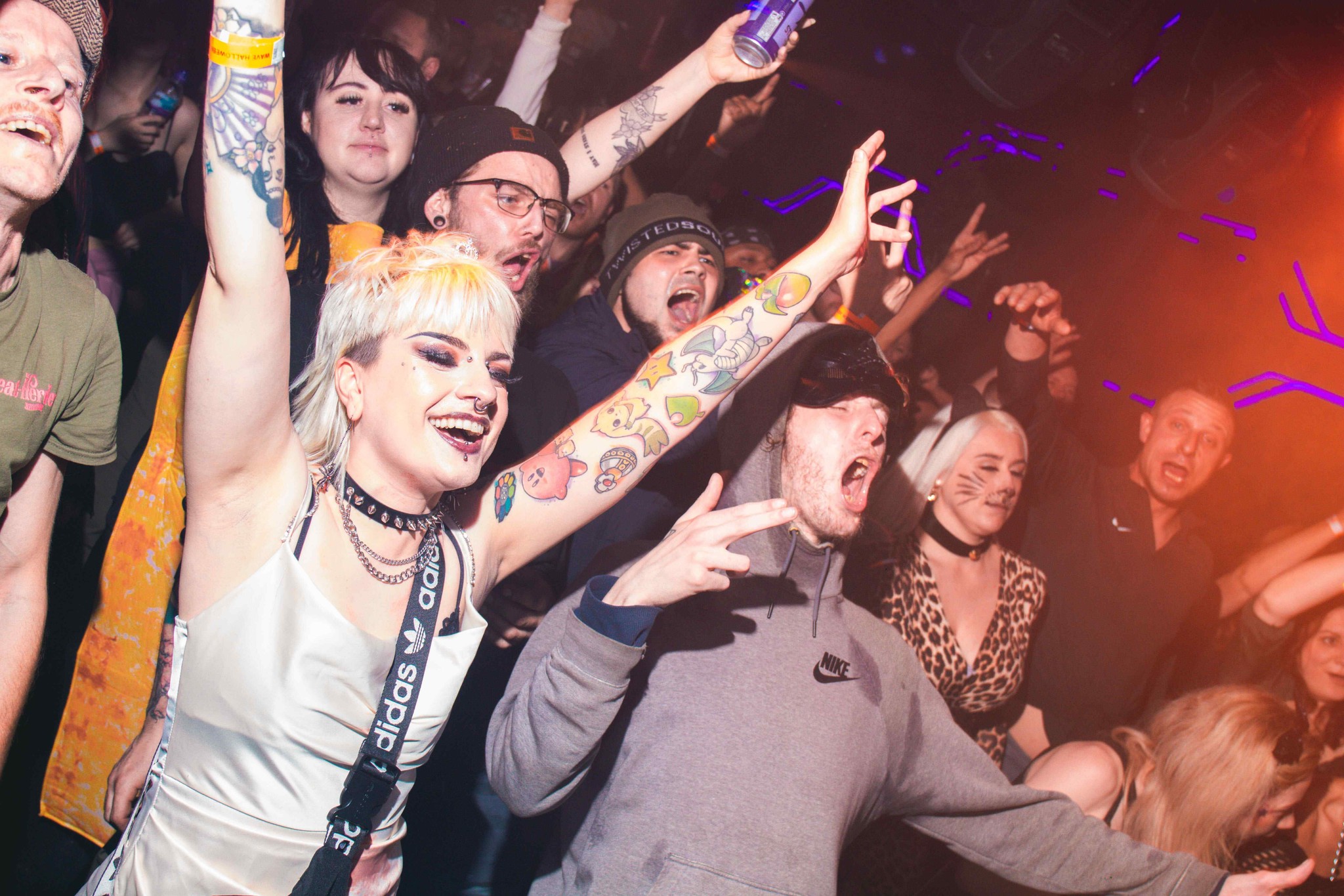 Image of a crowd of people cheering.