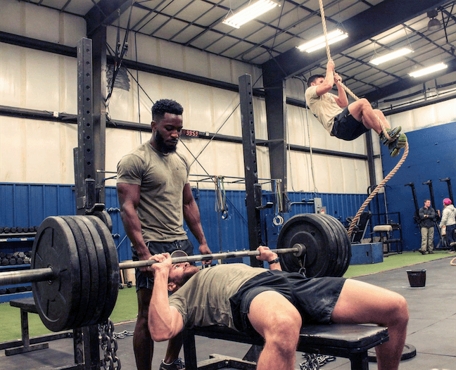 a group of people playing a game of ice hockey