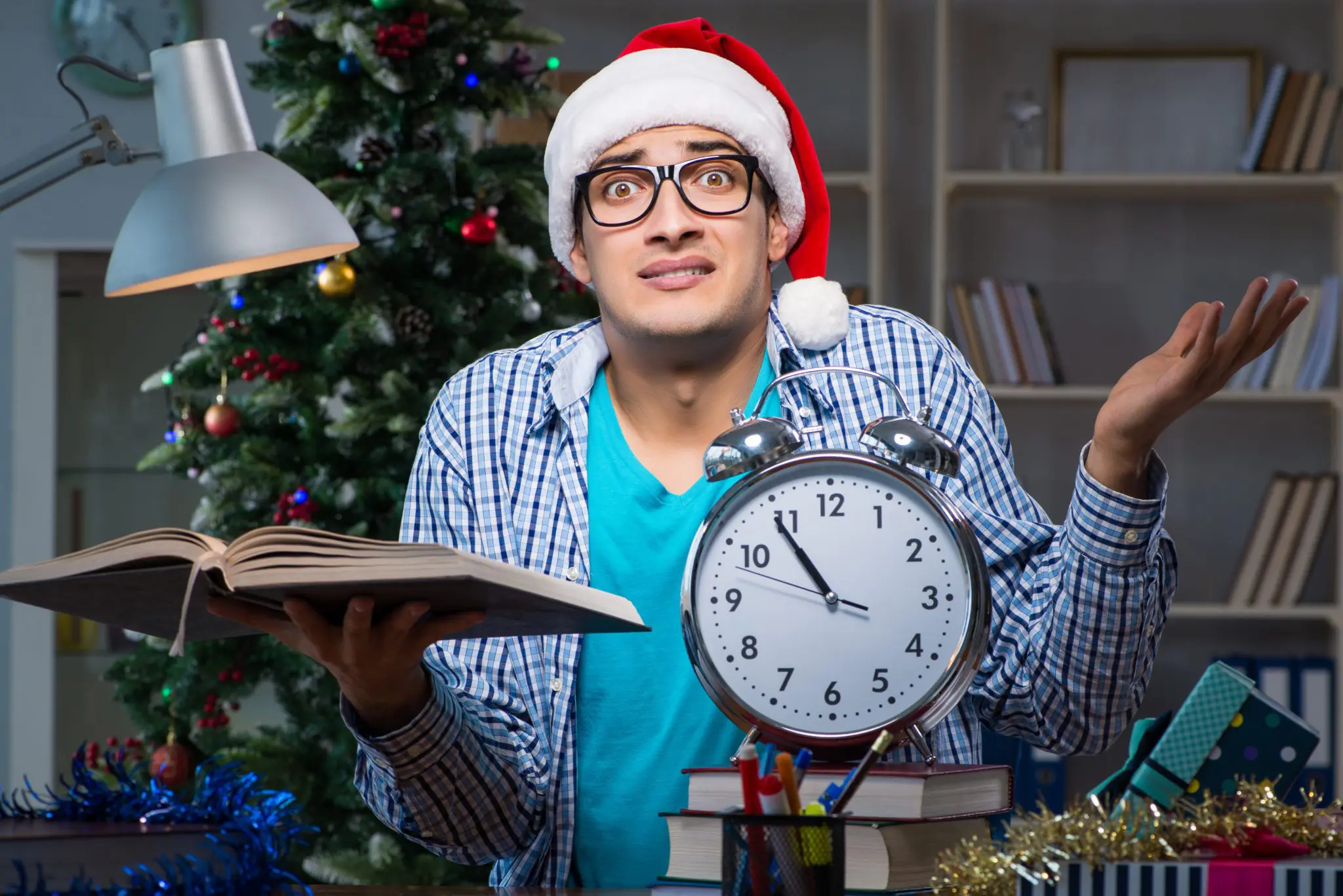 Young man wearing a Christmas hat
