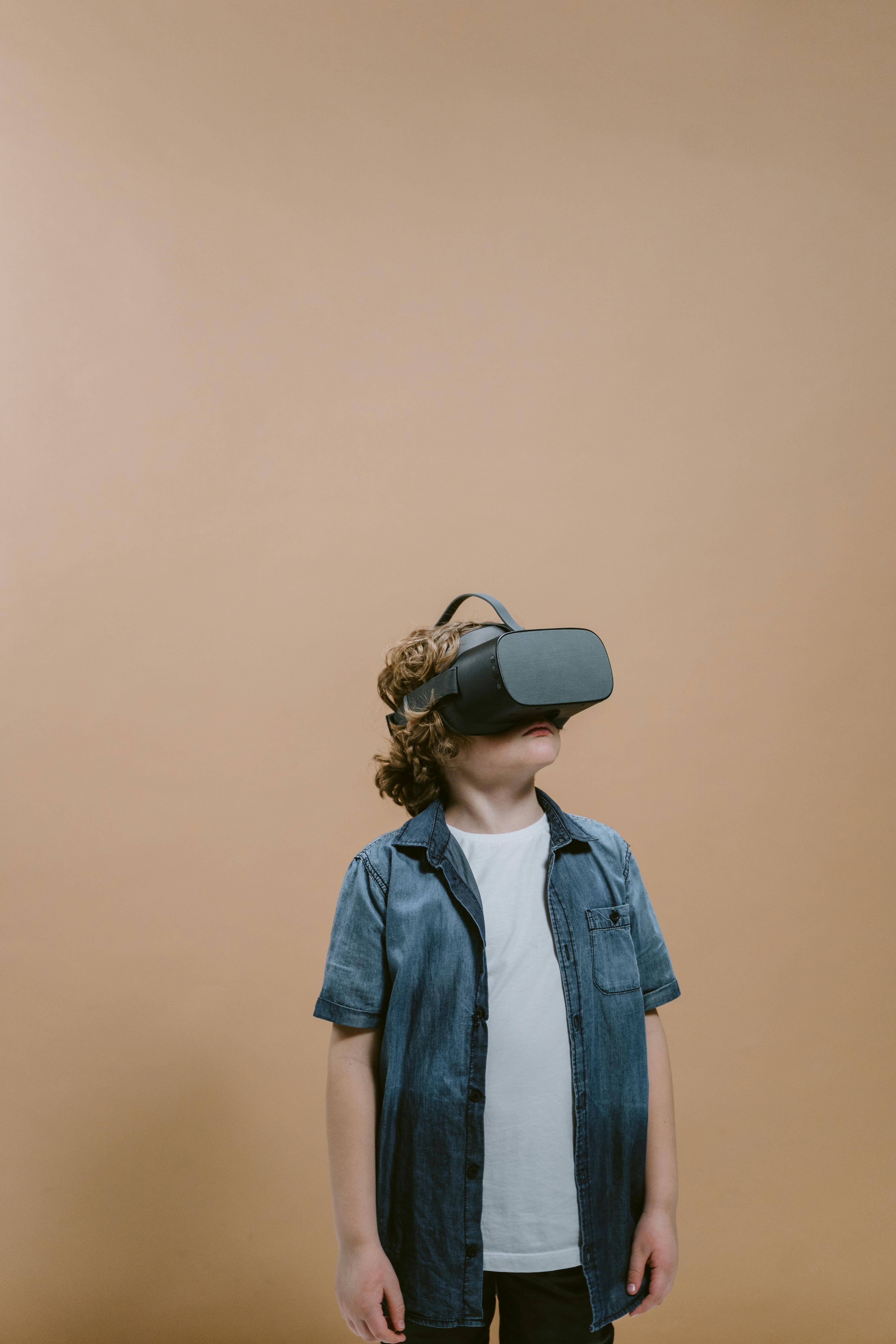 A child alone, wearing a VR headset