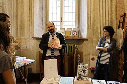A man explaining about a book