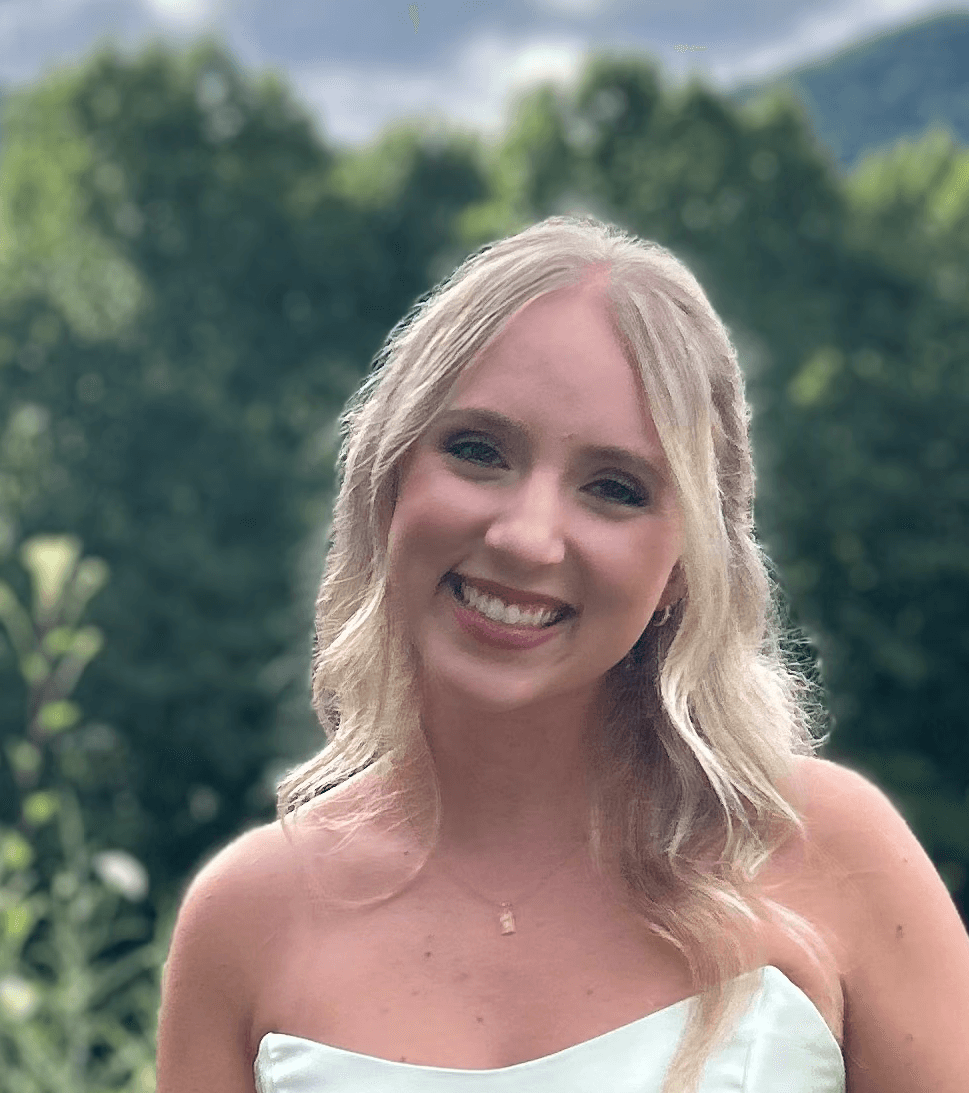 portrait photography of man wearing black suit jacket