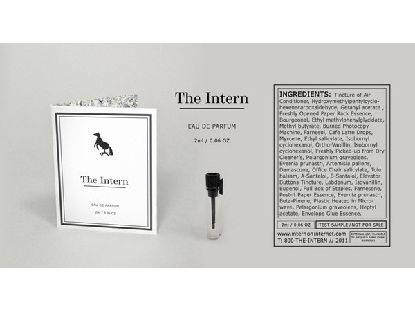 The image shows a rectangular box of perfume labeled “The Intern,” accompanied by a small vial of perfume and a folded card displaying the perfume’s name and description in French. The box indicates the perfume contains 2ml or 0.06 oz of the product. The card features a black horse logo and identifies it as Eau de Parfum. The box also includes a list of ingredients: Tincture of Air, Conditioner, Hydroxymethylpentylcyclohexanecarboxaldehyde, Geranyl acetate, Freshly Opened Paper Rack Essence, Bourgeoisol, Ethyl methylphenylglycidate, Methyl butyrate, Burned Photocopy Machine, Farnesol, Café Latte Drops, Myrcene, Ethyl salicylate, Isobornyl cyclohexanol, Ortho-Vanillin, isobornyl cyclohexanolol, Freshly Picked-up from Dry Cleaner’s, Pelargonium graveolens, Evernia prunastri, Artemisia pallens, Damascone, Office Chair salicylate, Tolu balsam, A-Santalol, B-Santalol, Elevator Buttons Tincture, Labdanum, Isovanillin, Eugenol, Full Box of Staples, Farnesene, Post-it Paper Essence, Evernia prunastri, Beta-Pinenene, Plastic Heated in Micro-wave, Pelargonium graveolens, Heptyl acetate, Evangeline Glue Essence. The box also displays a website address (www.intern-intern.com) and a phone number (800-THE-INTERN).