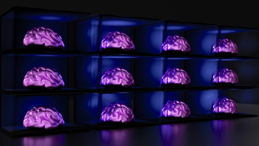 A futuristic display of multiple glowing purple brains in a dark setting, each brain housed in a separate compartment with vibrant blue backlighting, evoking themes of advanced technology and artificial intelligence.