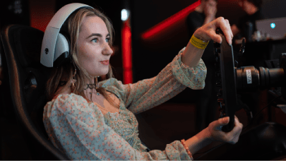 Person playing on the racing rigs