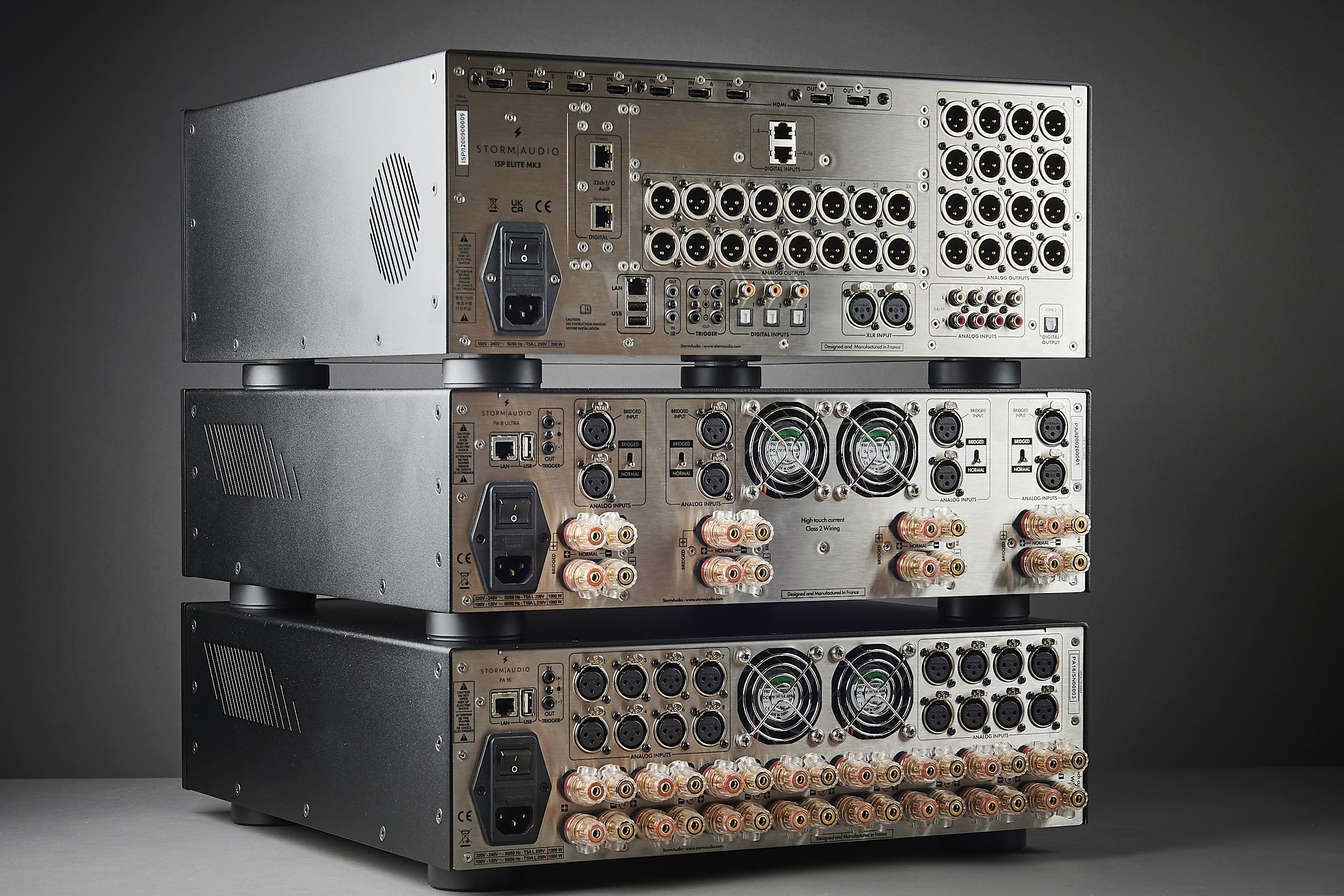 Stack of three AV receivers with many ports