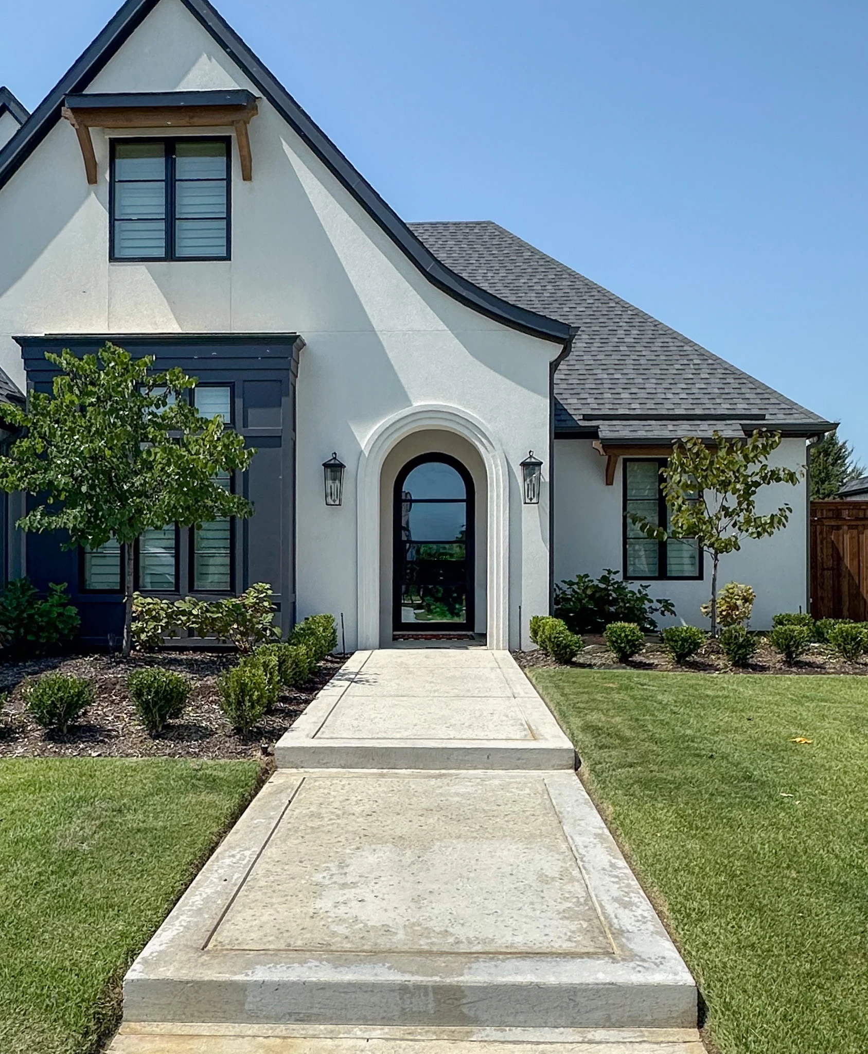 Traditional wrought iron double doors by M2 Metals Iron Doors DFW