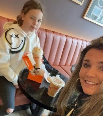 Angel Iris out with the child she is babysitting