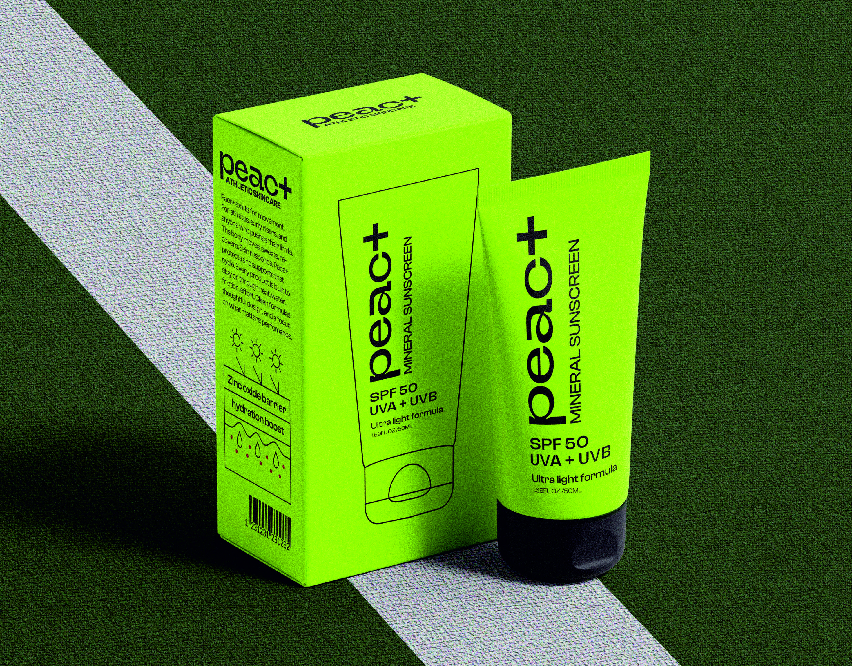 Close-up of a yellow tennis ball sitting on a green court, positioned near the white center line.