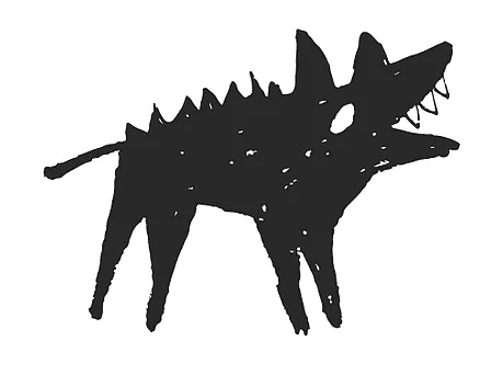 A close-up of a hand wearing multiple decorative rings against a blue background.