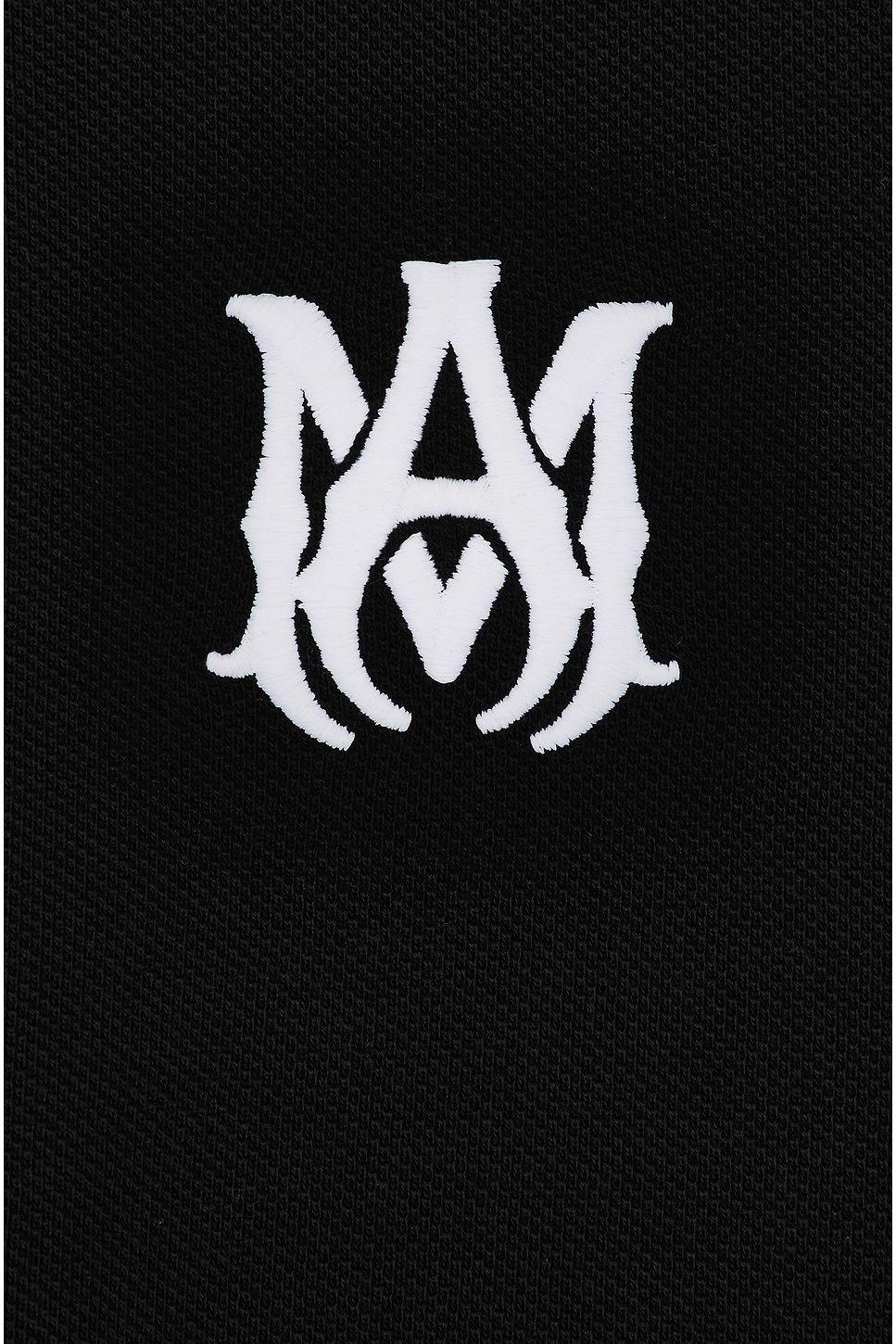 A black and white Amiri logo