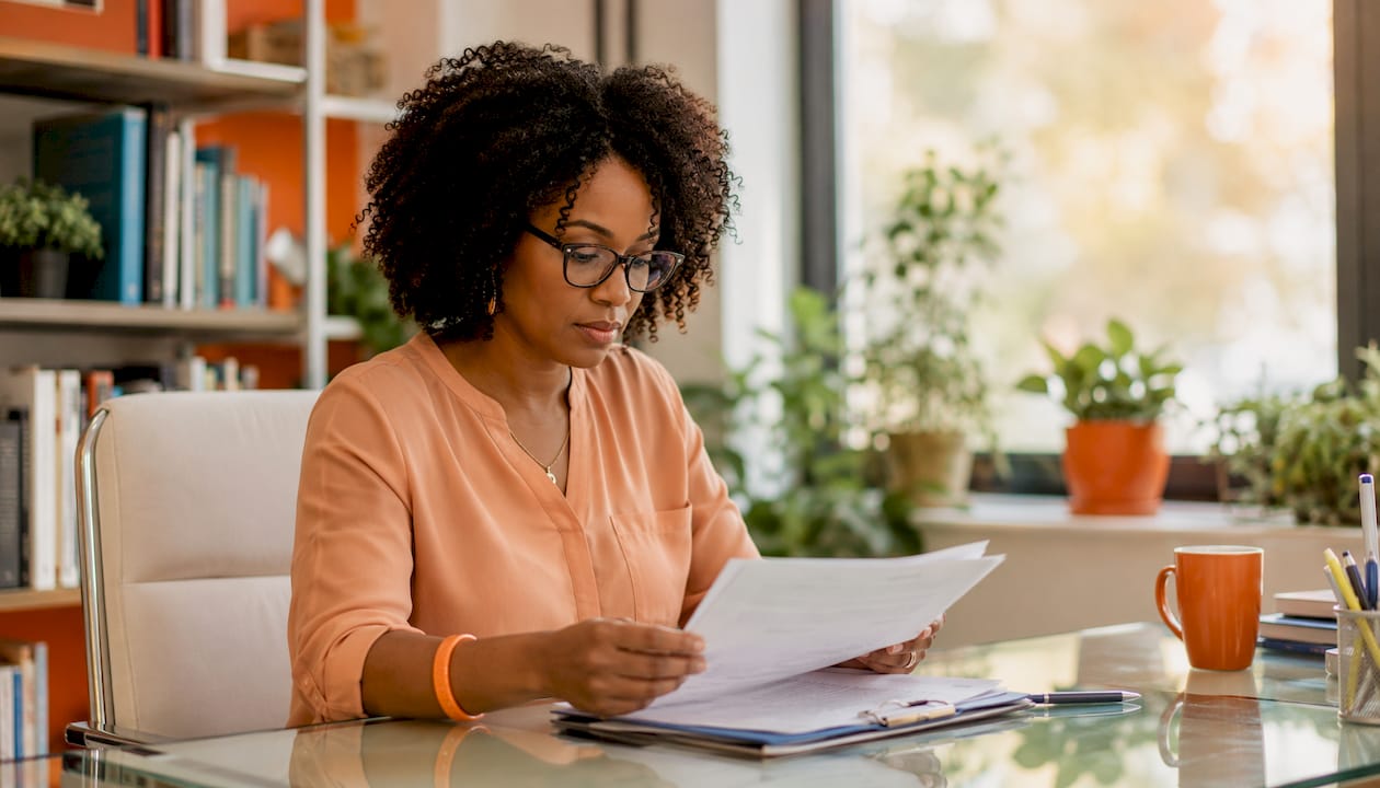 Psychologist reviewing diagnostic forms
