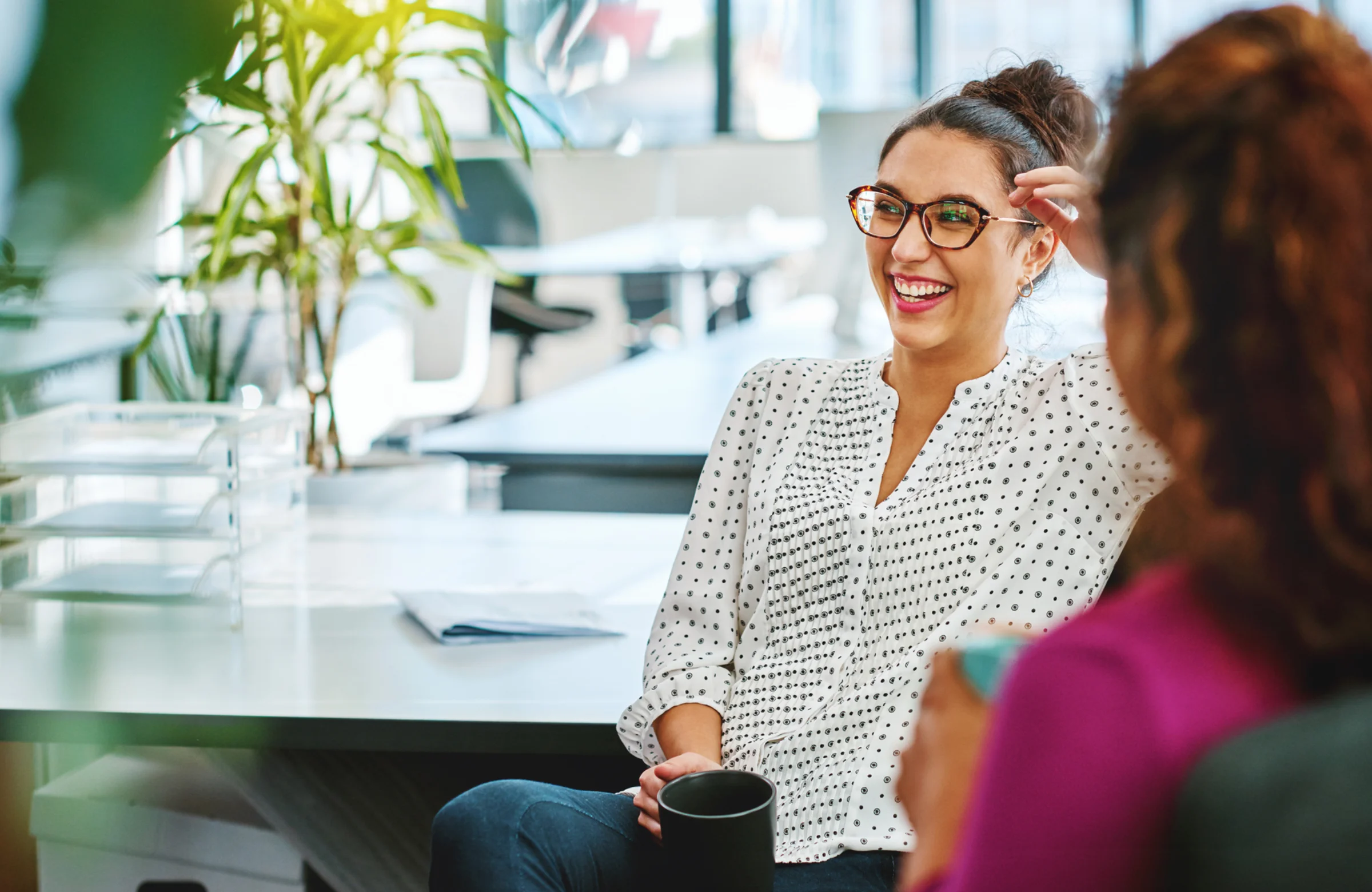 Support coordinator reviewing Nurseco nursing services in Brisbane office
