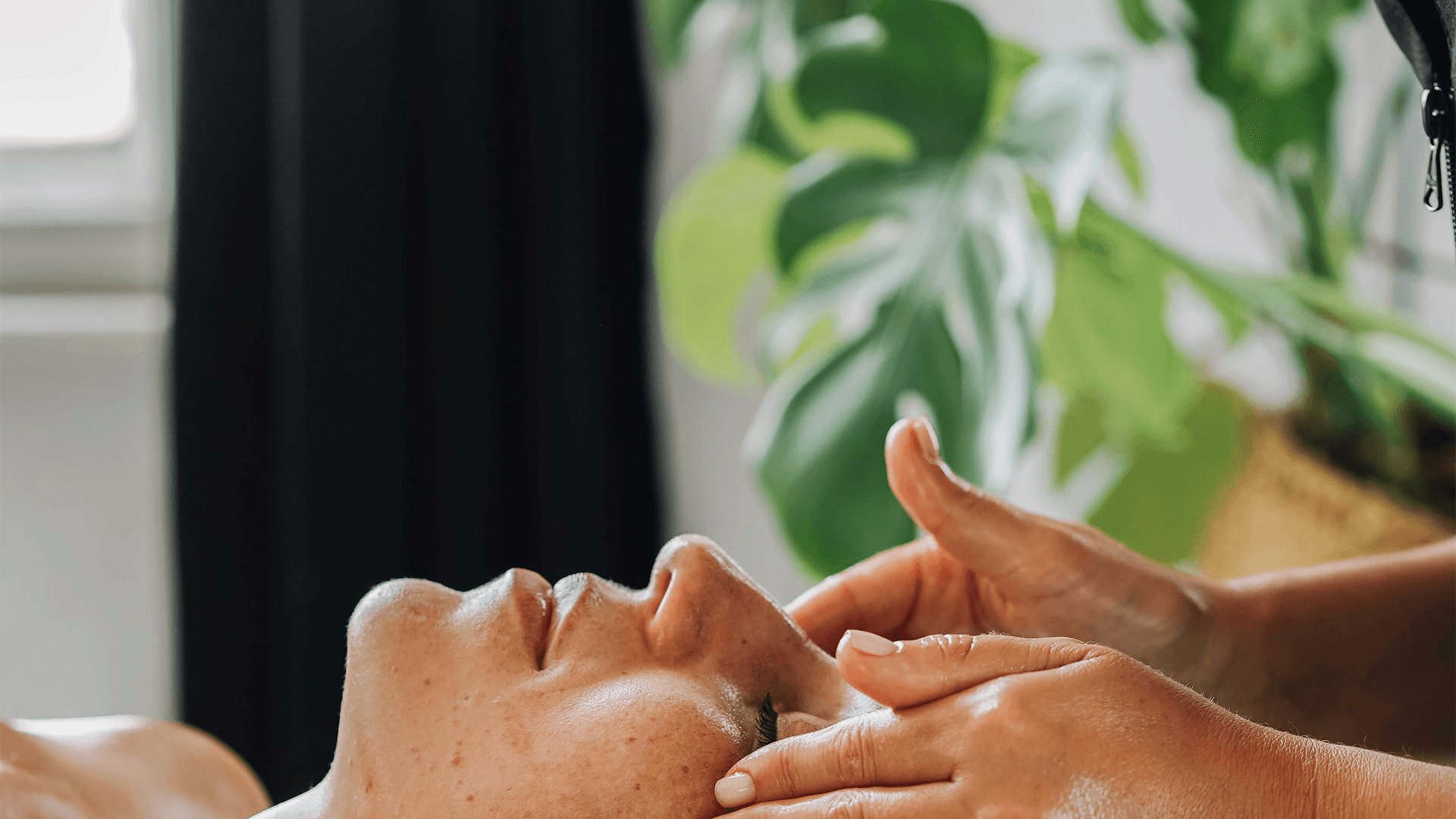 kids lying on a glass land and smiling