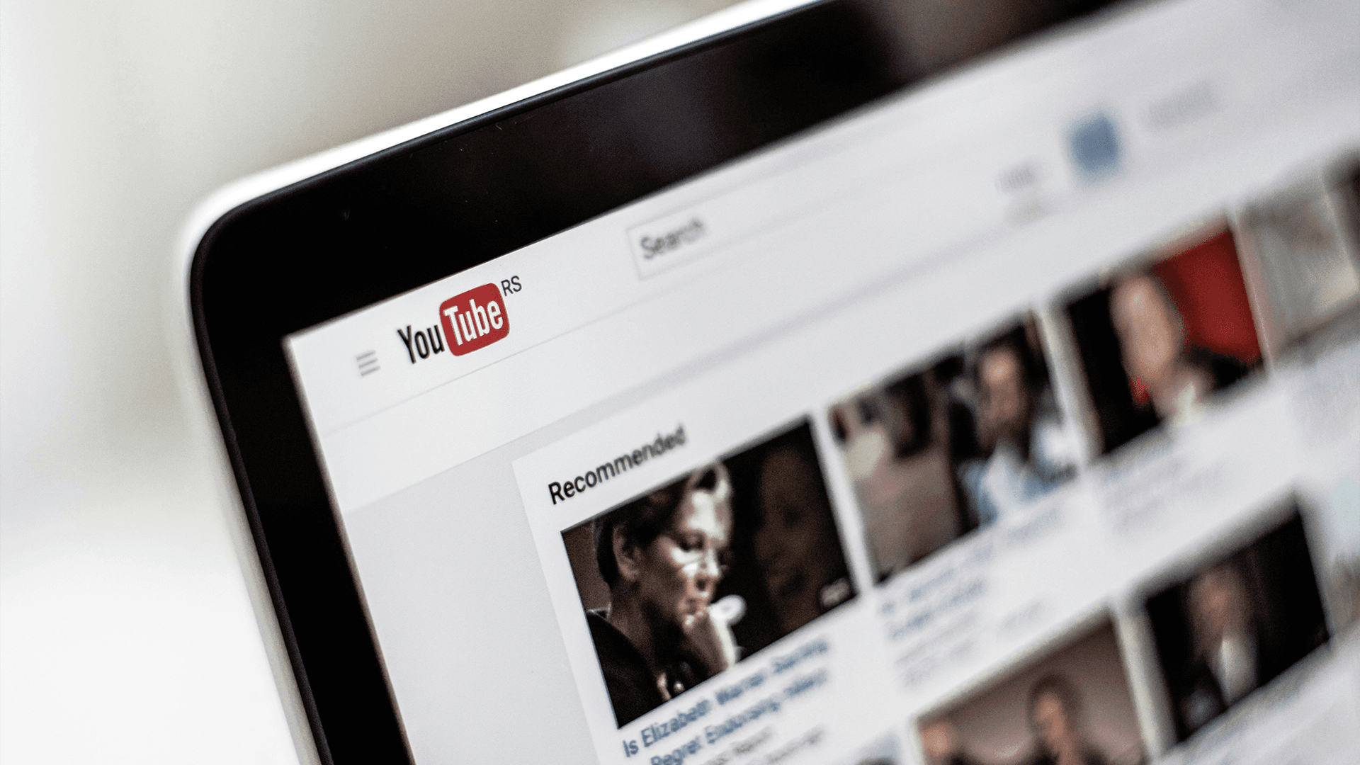YouTube home page loaded on laptop - YouTube Average View Duration
