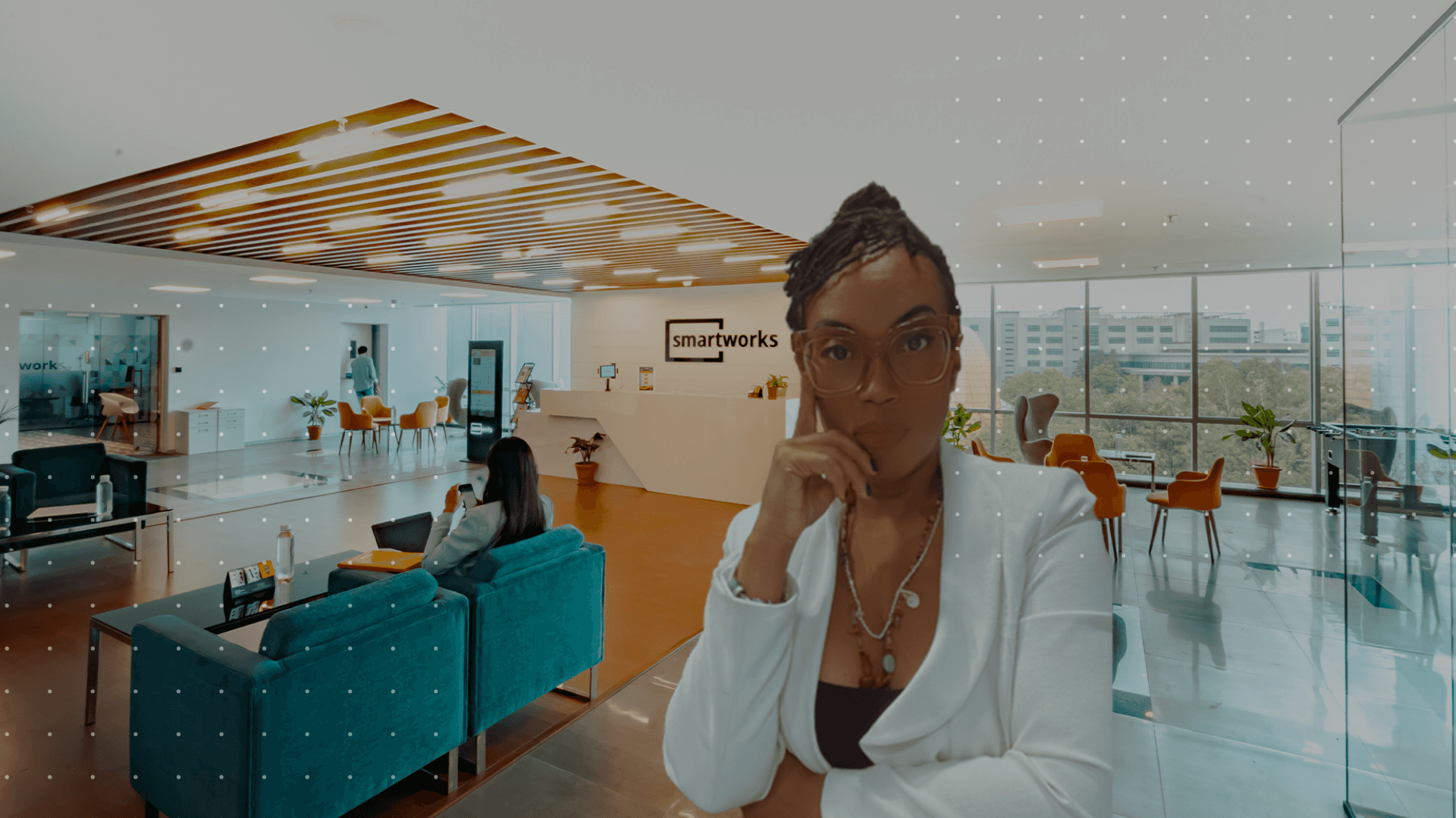 woman sitting to left of Ria Found of DariaCreativeCo in Workspace