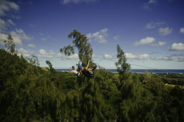 two men ziplining in oahu
