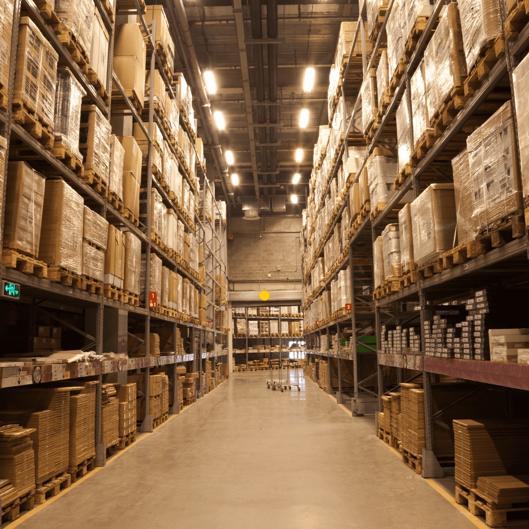 two ladies looking at a laptop and smiling