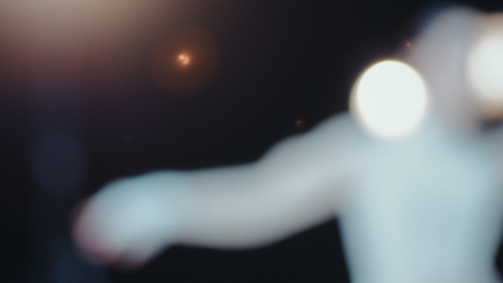 A woman and two young girls laying together