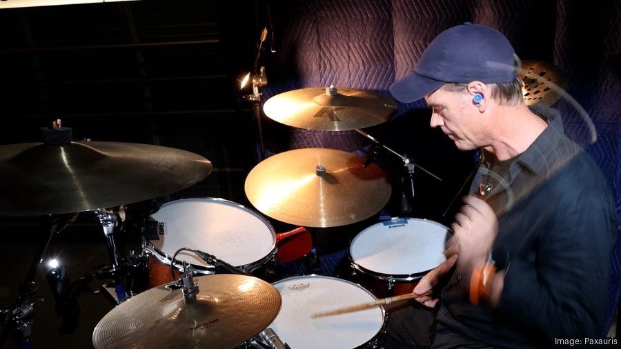 a black and white living room with a large tv