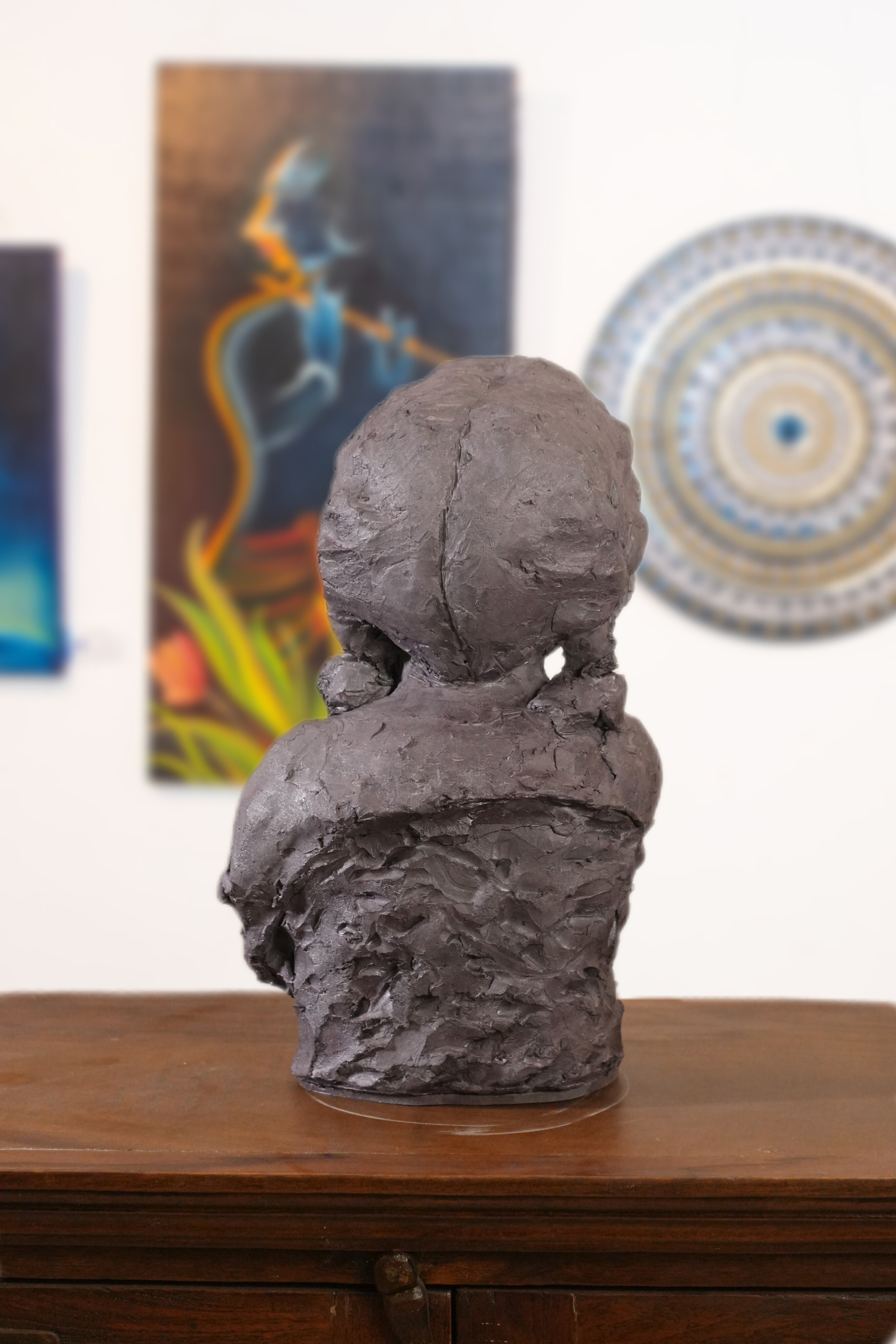 portrait sculpture of a young child