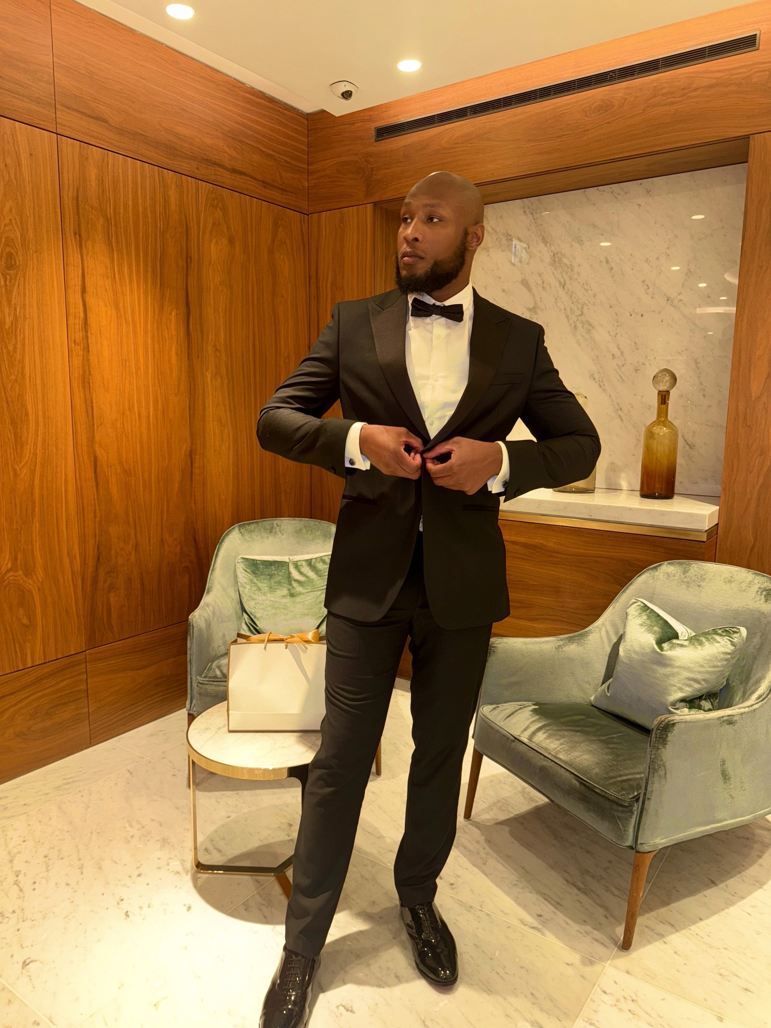 Man kneeling in studio