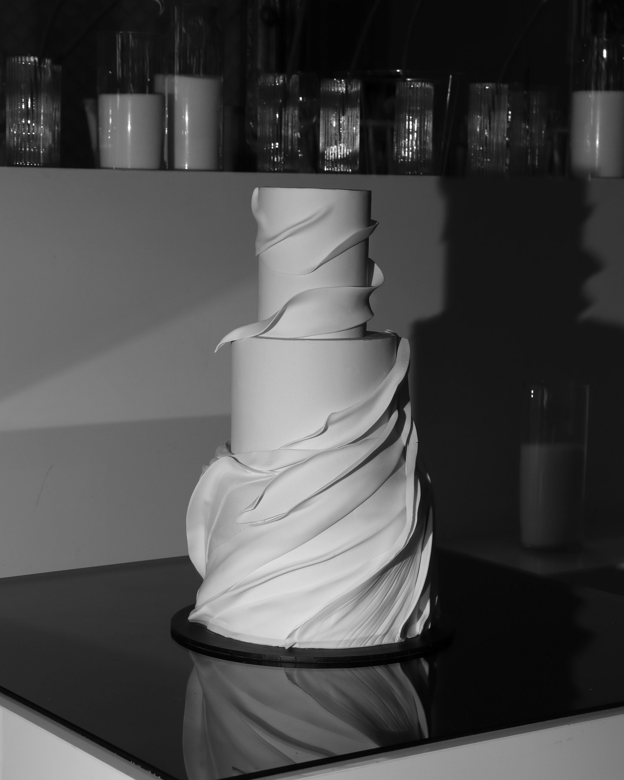 three tier wedding cake with soft elegant draping in Melbourne wedding