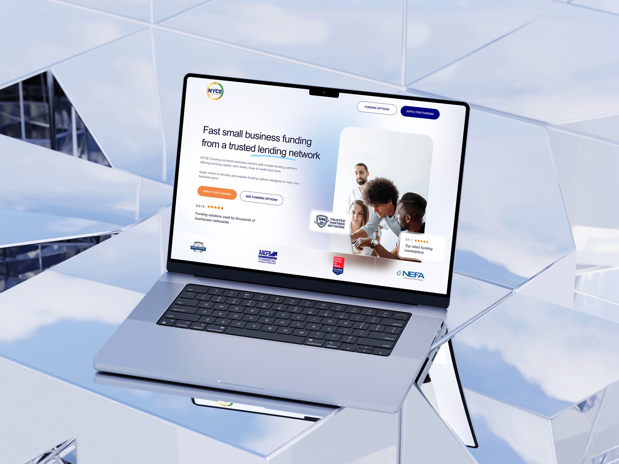 Laptop displaying funding website homepage with clear value proposition and call to action