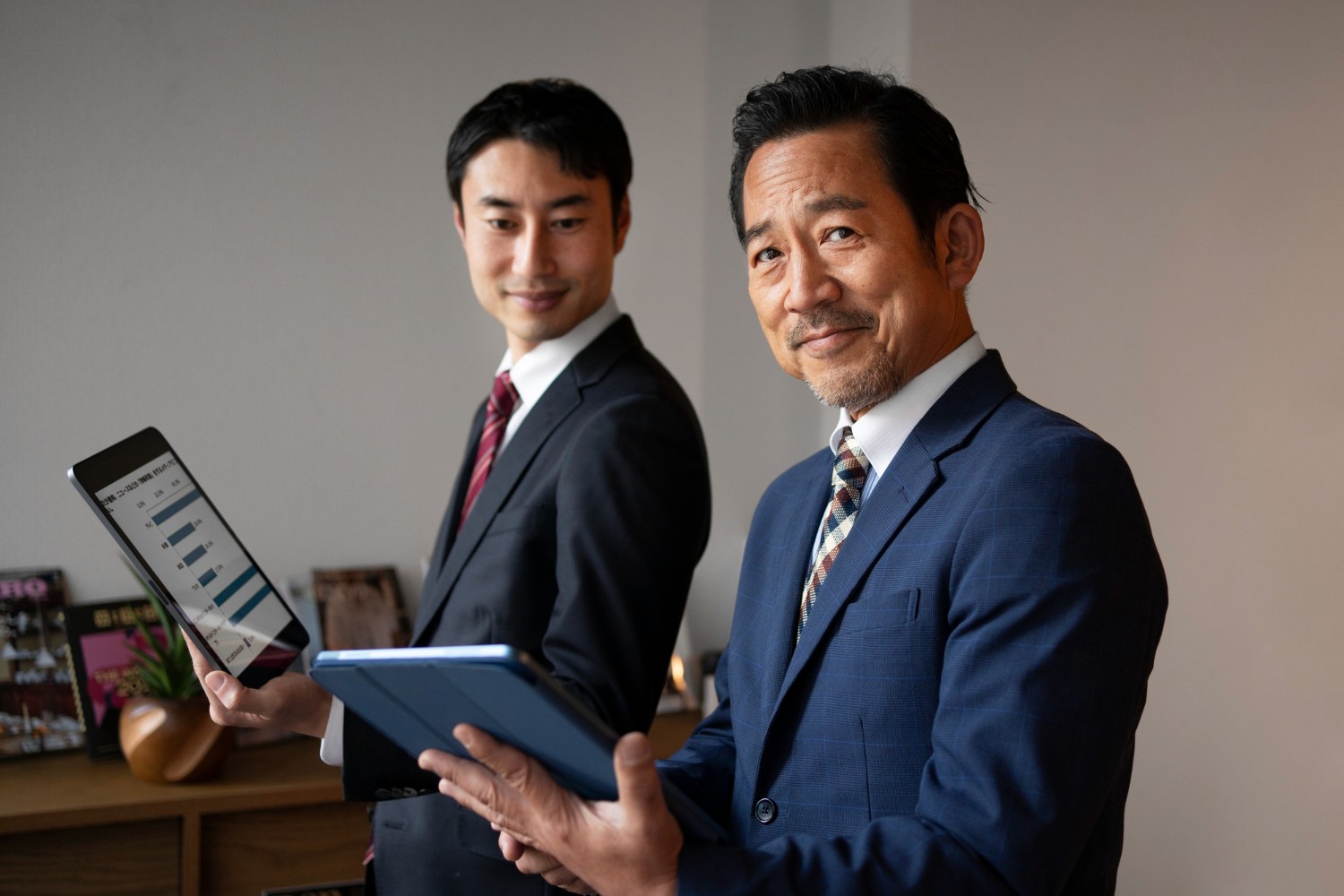 D&O保險頁面配圖：高級董事坐於辦公室內，象徵企業決策、管理責任及董事高管責任風險保障 / D&O insurance page image of a senior executive seated in an office, representing corporate decision-making, management responsibility and directors and officers liability protection