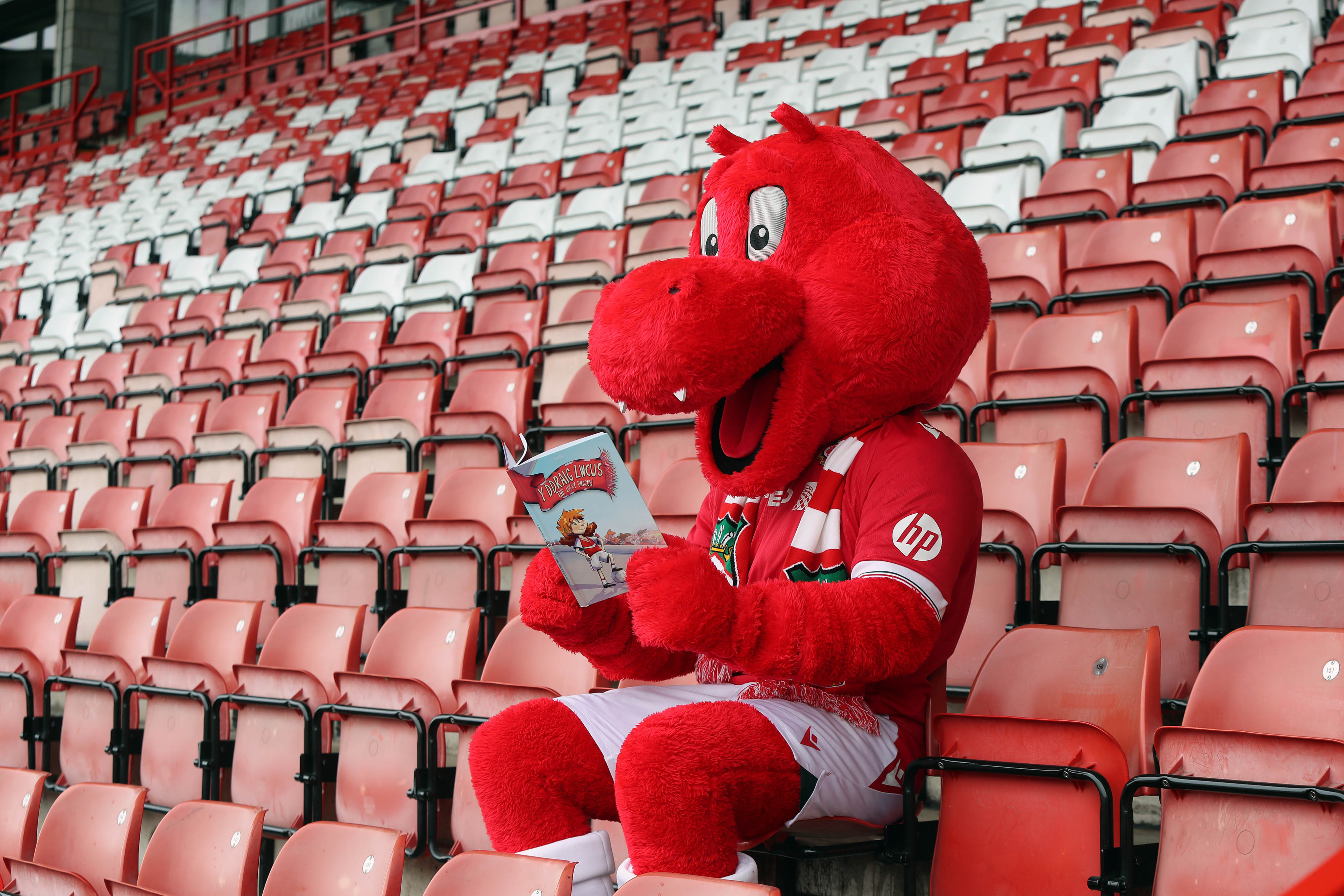 image of a smartphone leaning on top of a record player
