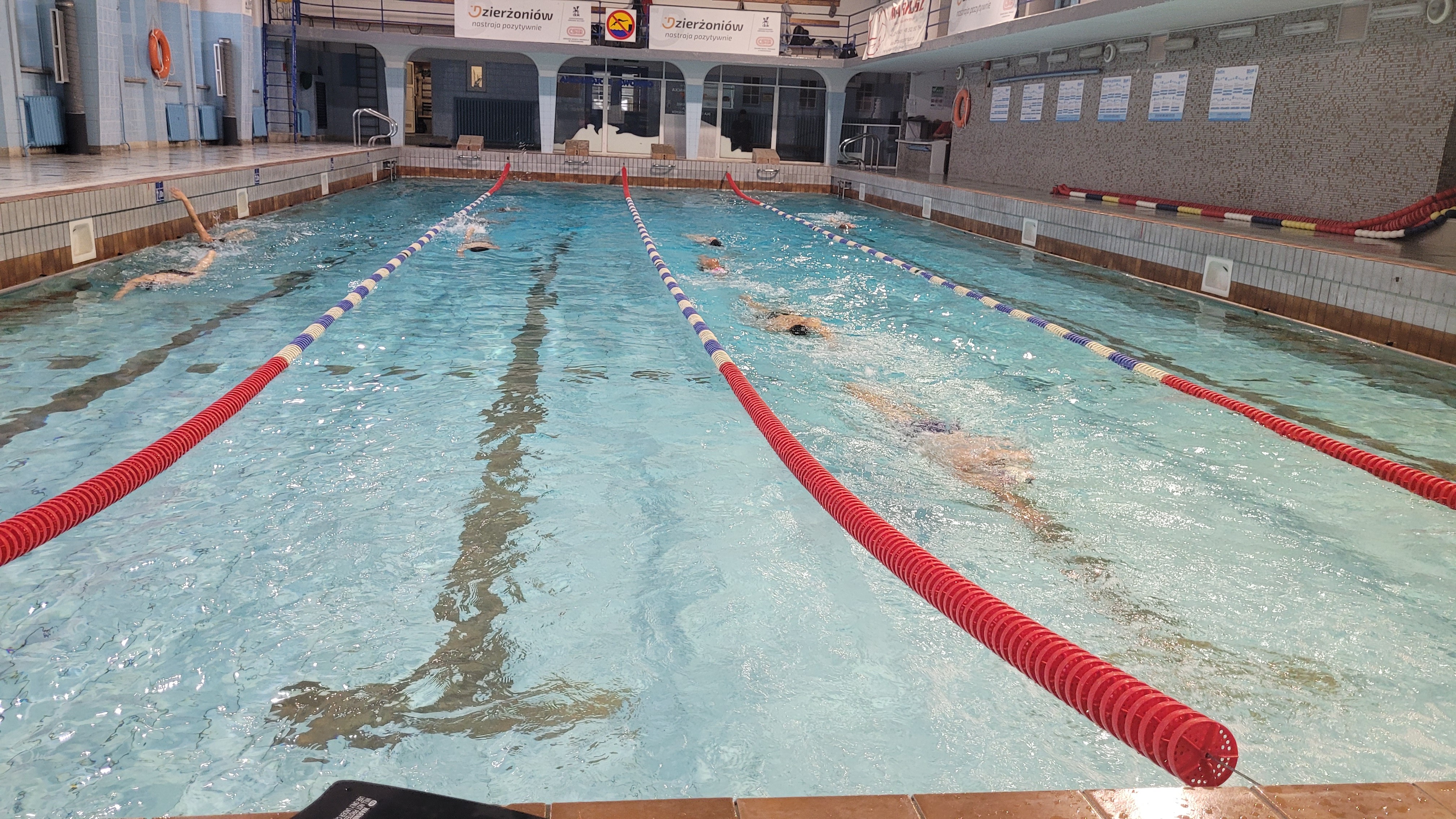 A kid practicing surfing